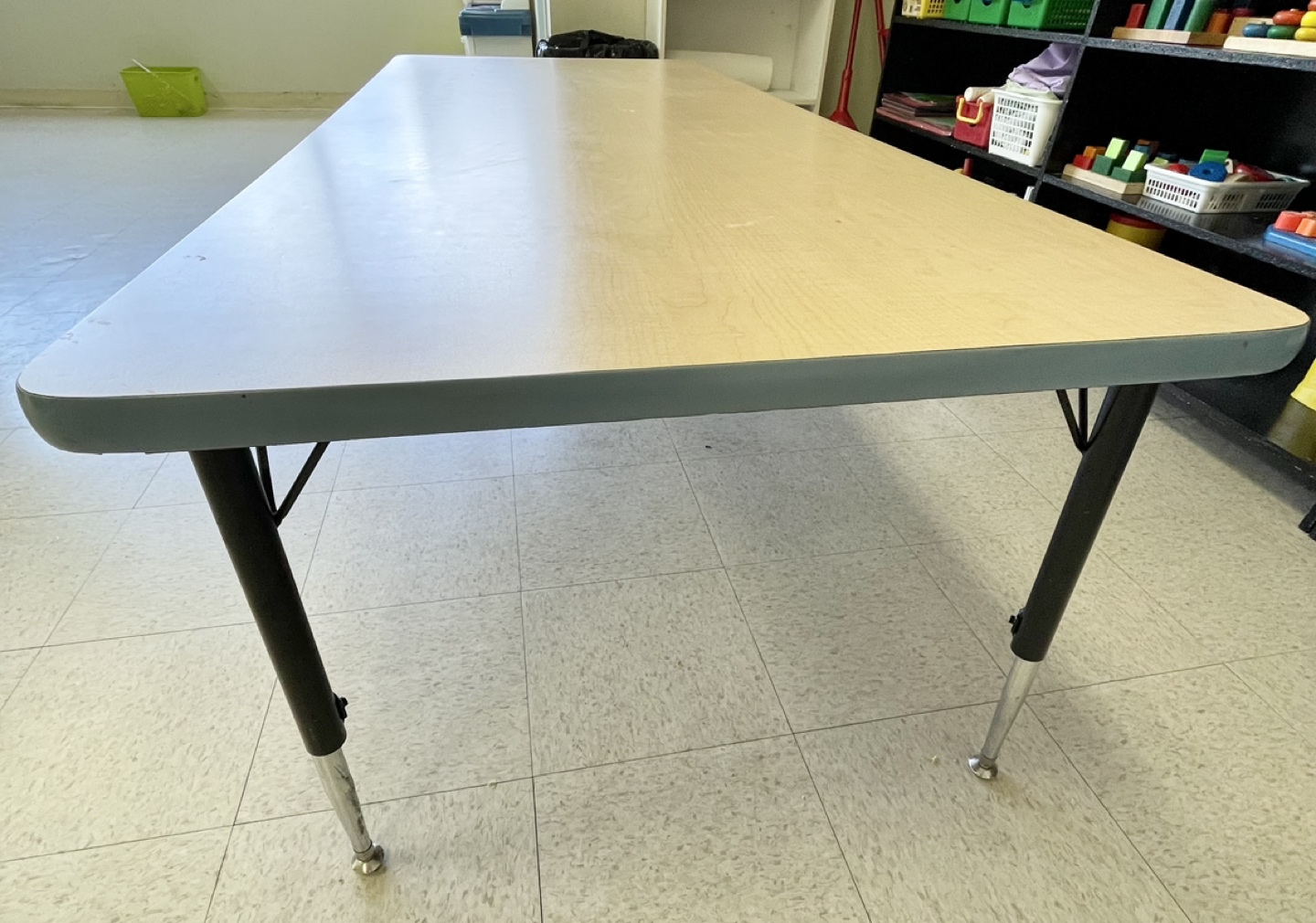 Adjustable table, rectangle maple with blue, 30”D x 72”W x 25”H. - photo 3