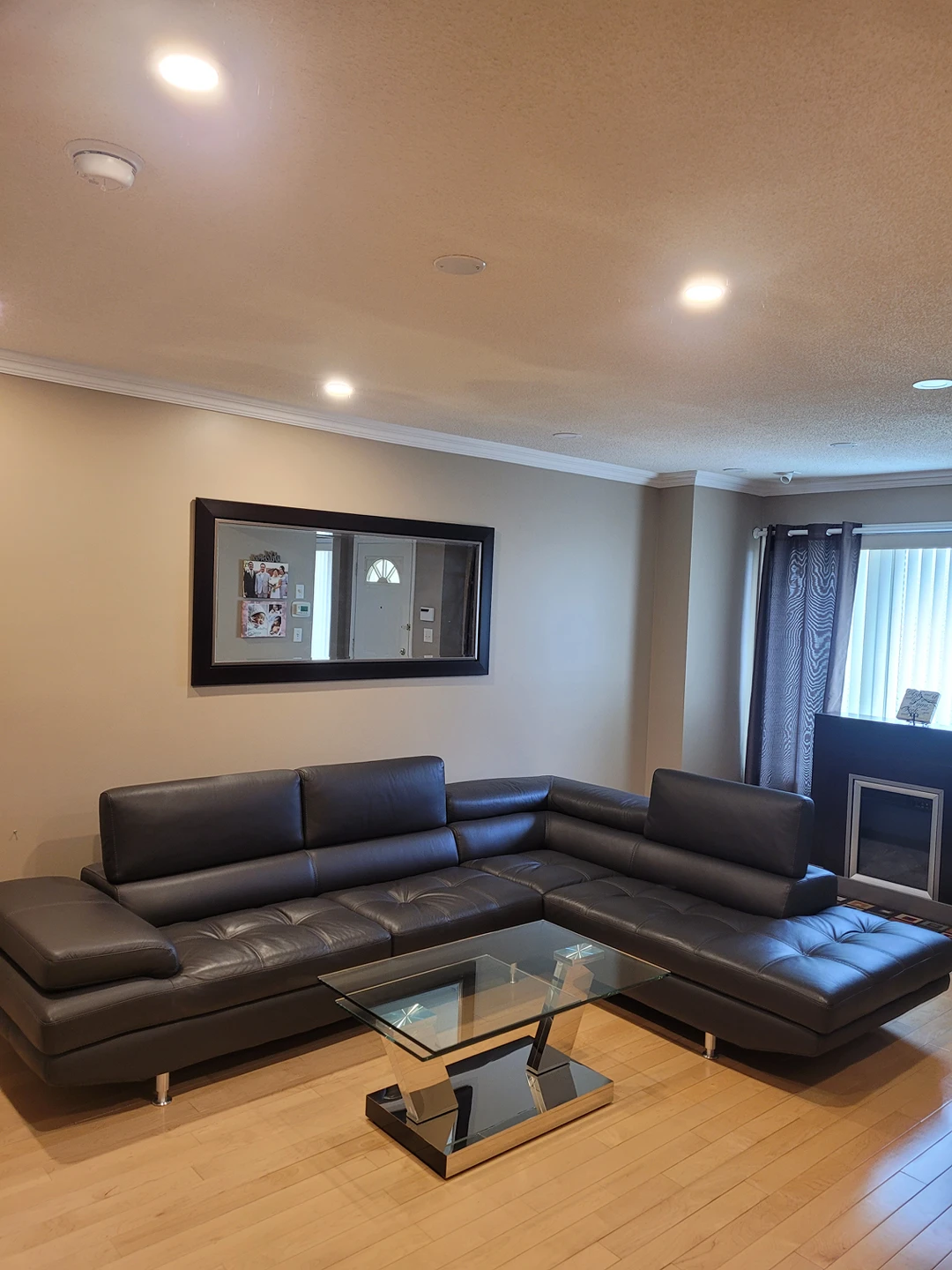 Beautiful Italian leather sofa and glass coffee table