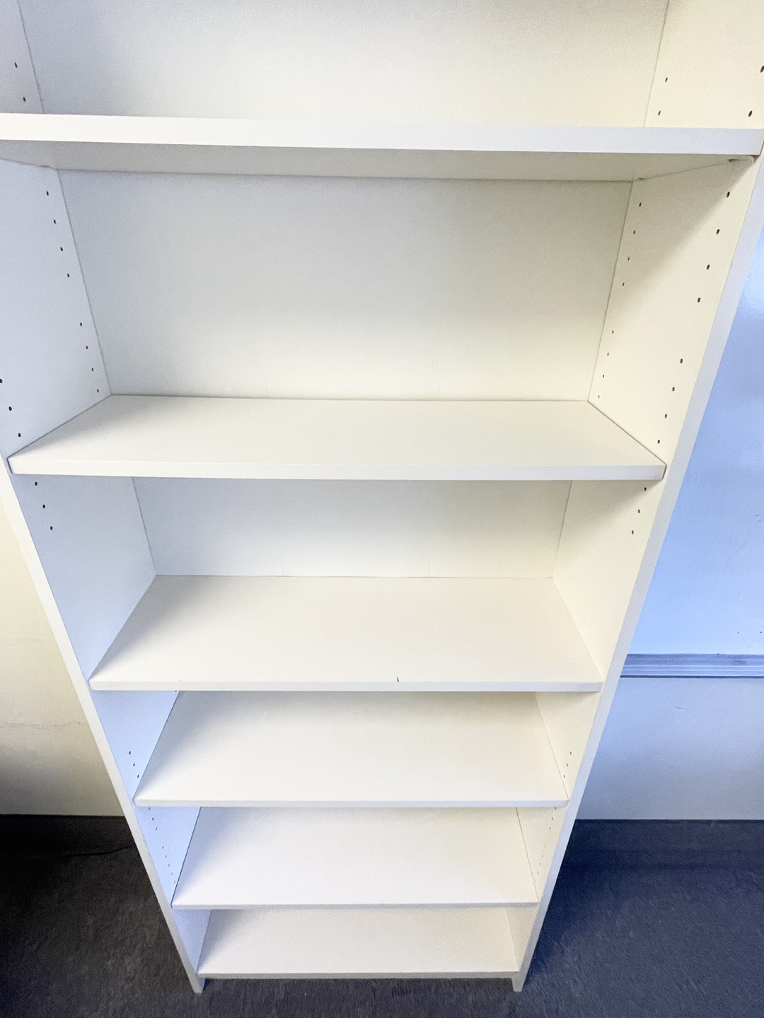 White bookshelf 31 1/2” W x 11”D x 79”H