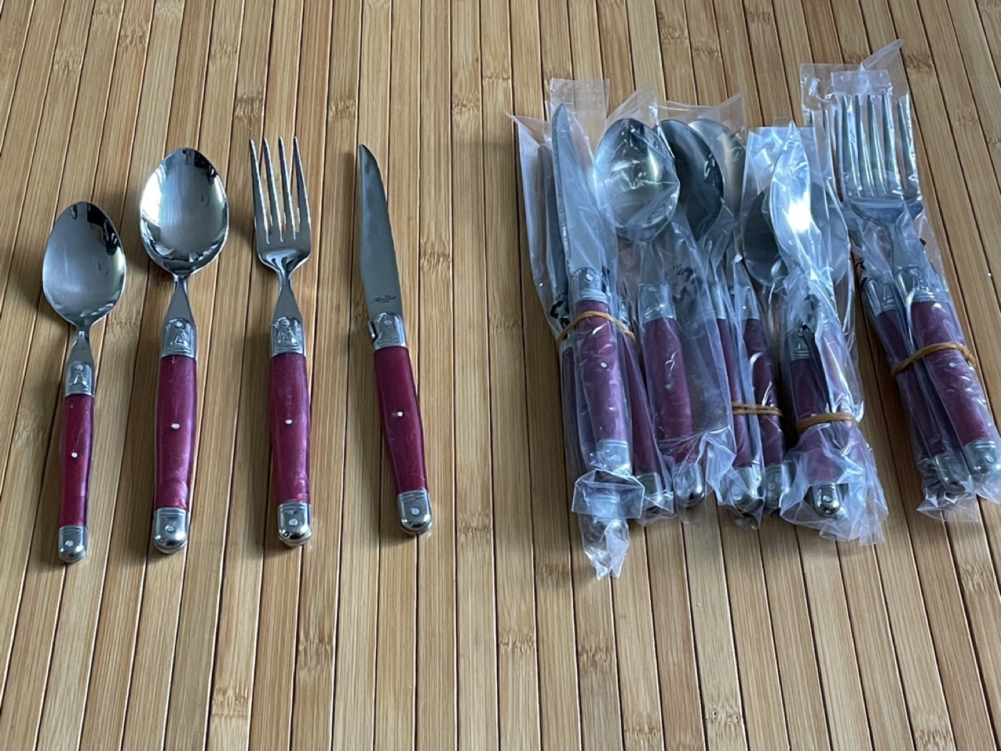 Four place cutlery setting. New. Never used. thumbnail