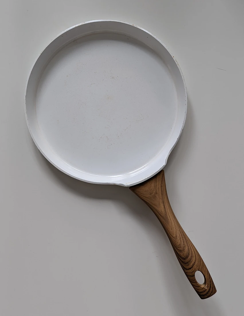 Crepe pan with wooden handle - food photography prop thumbnail