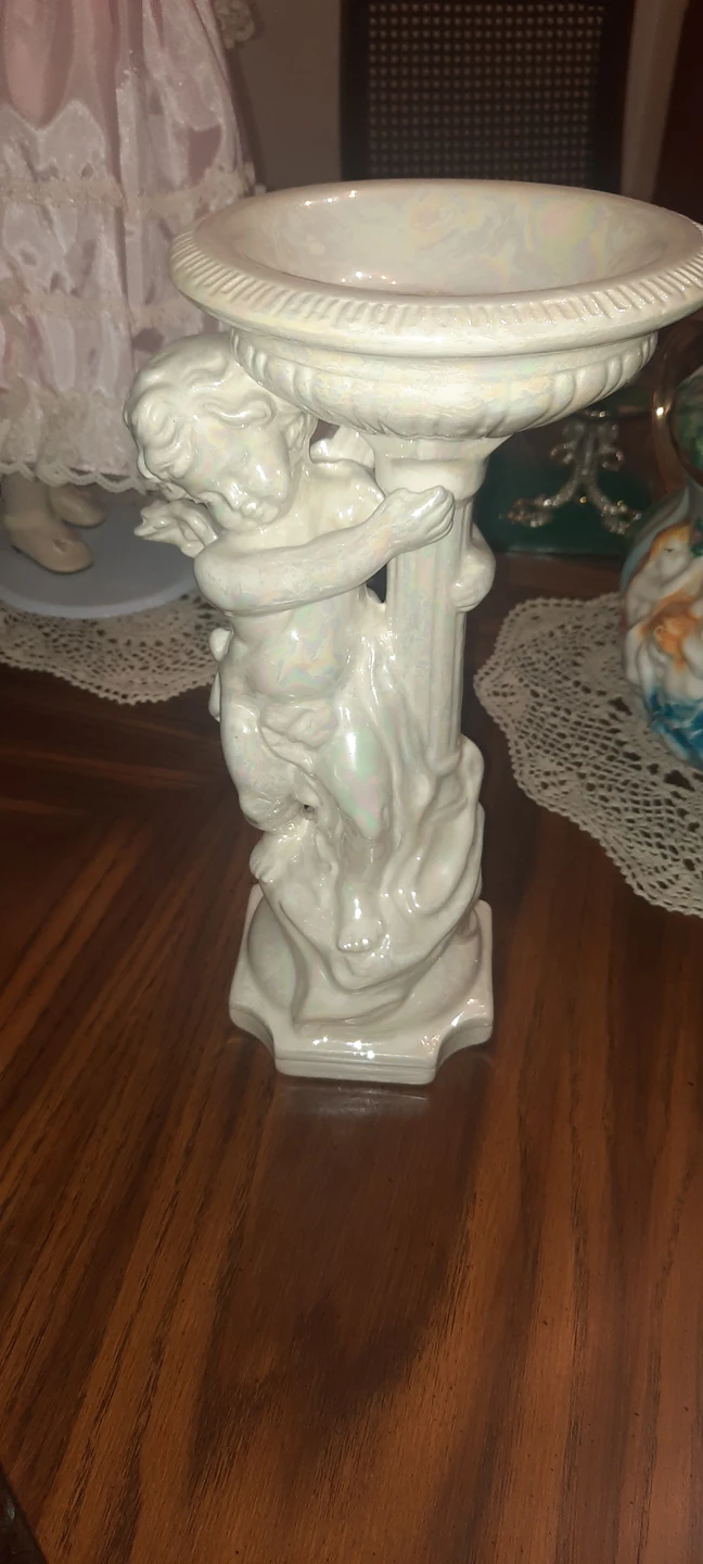 white cherub piller