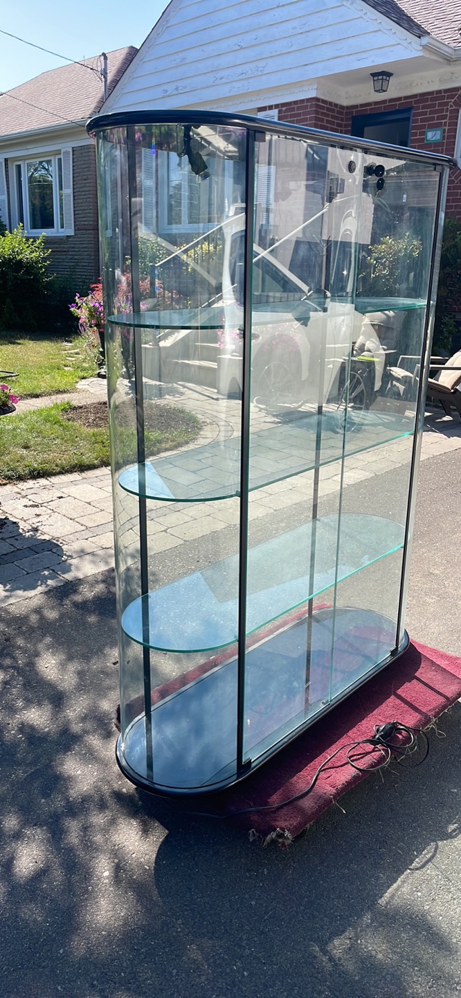 Oval Glass curio cabinet locks & Lightning