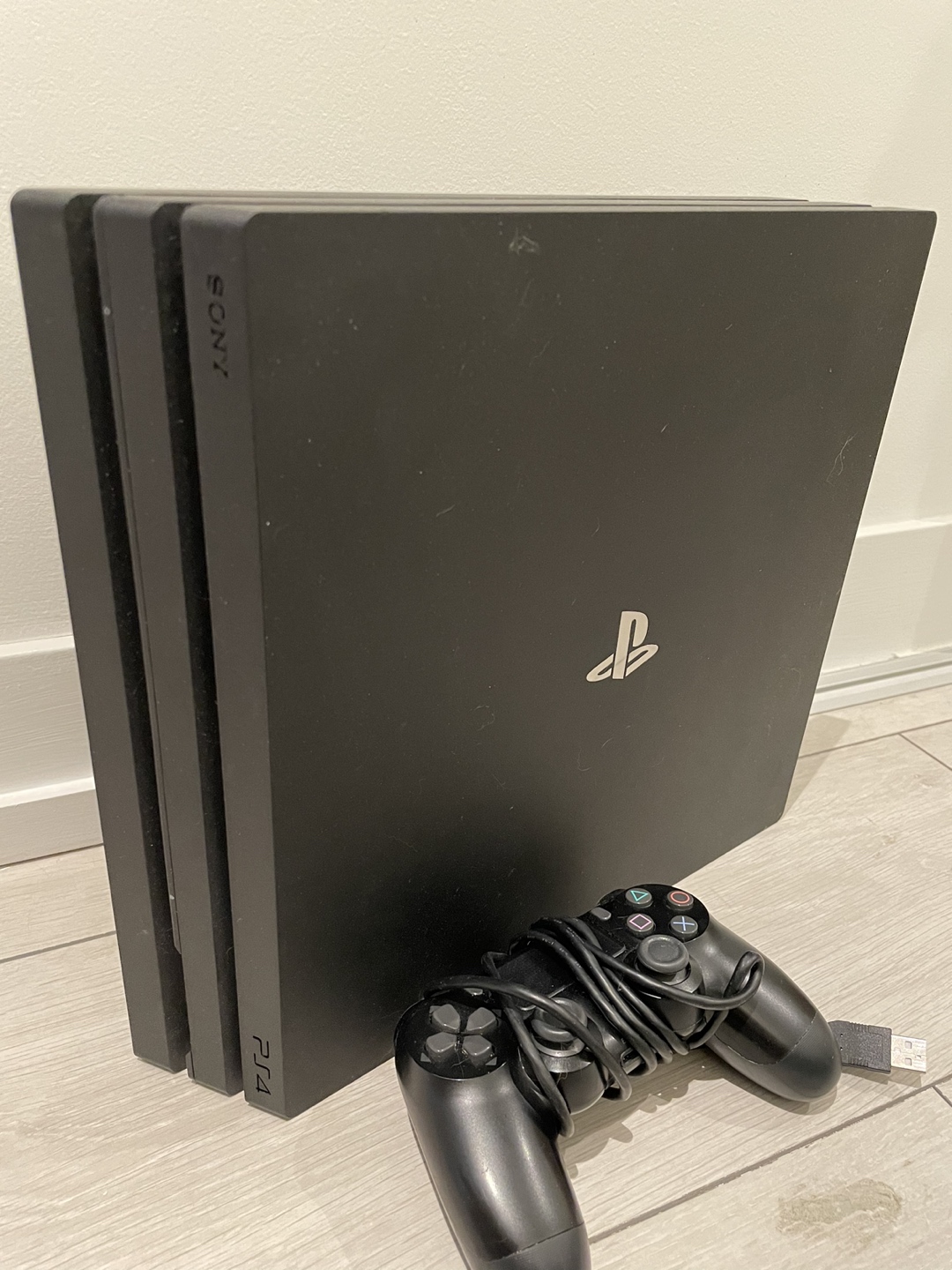 PS4 pro console, 1 controller, 2 games thumbnail
