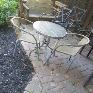 Glass top outdoor dining table