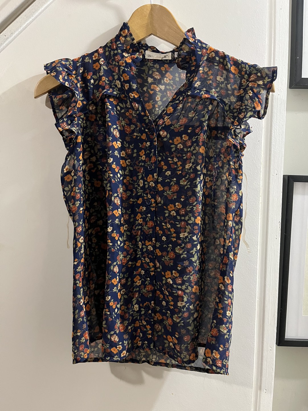 Light sleeveless, floral top