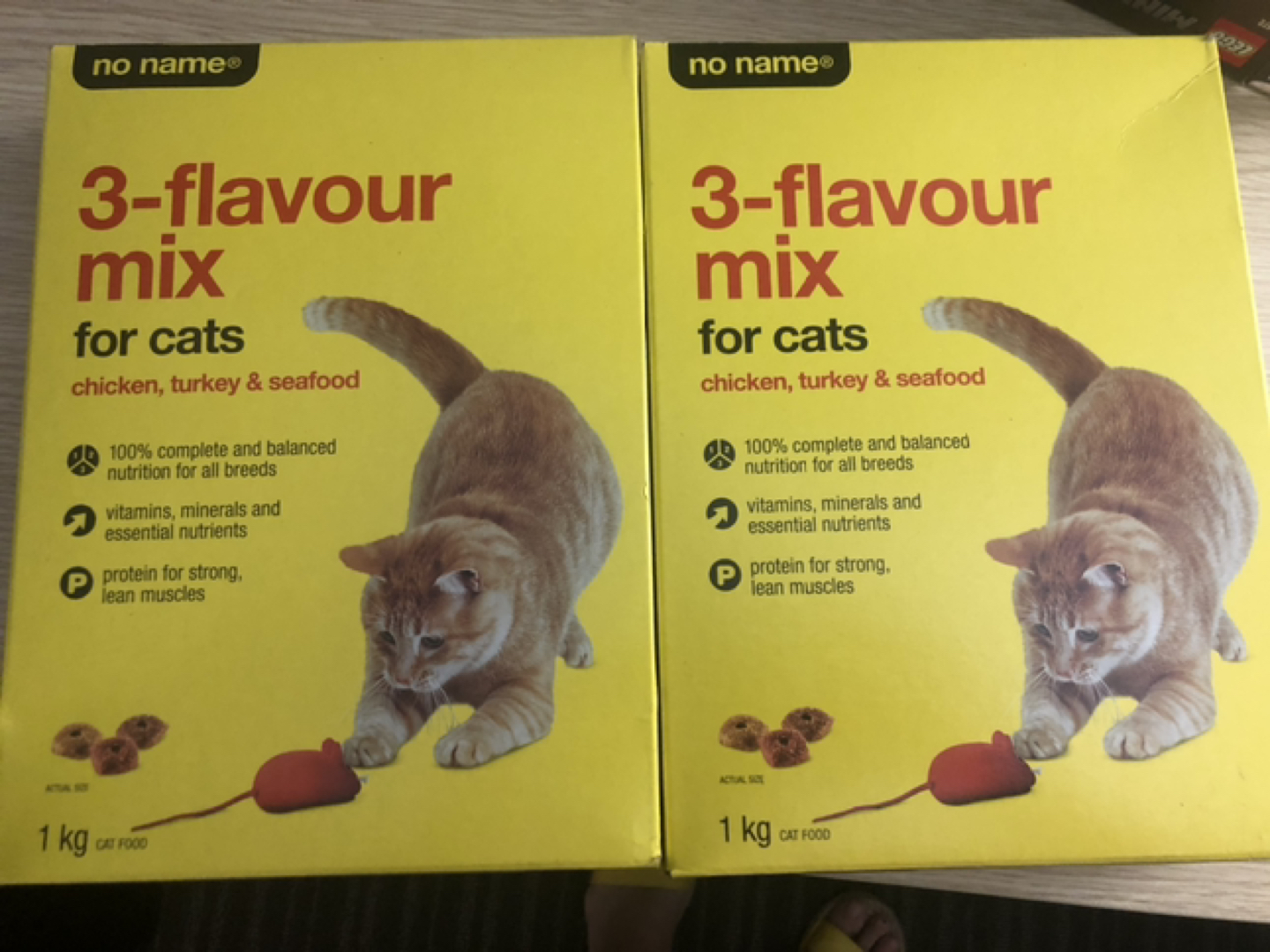 2 boxes of cat food