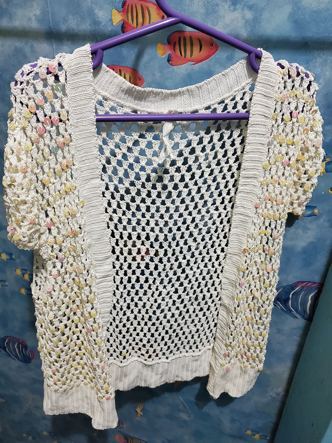 White sequin cardigan with necklace image indicator(2)