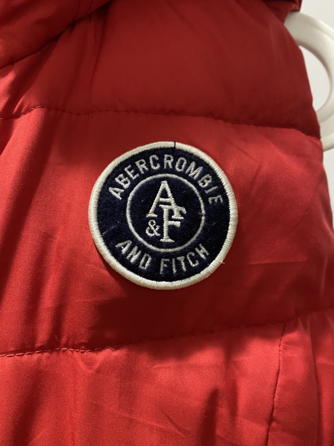 Puffer vest with hood - photo 2