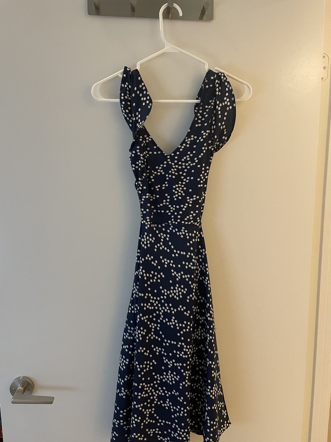 Navy dress with daisy print thumbnail