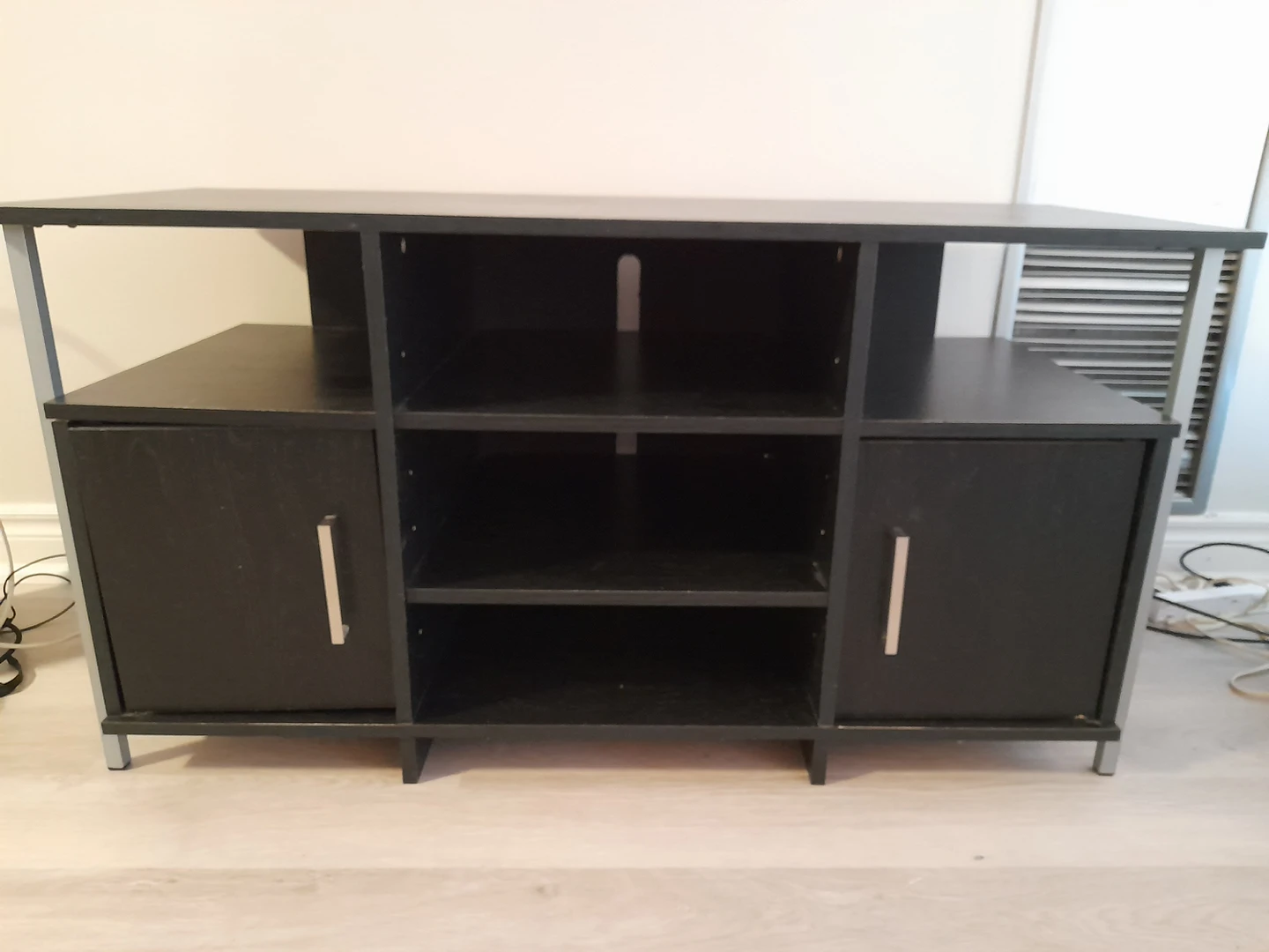 black TV stand with storage