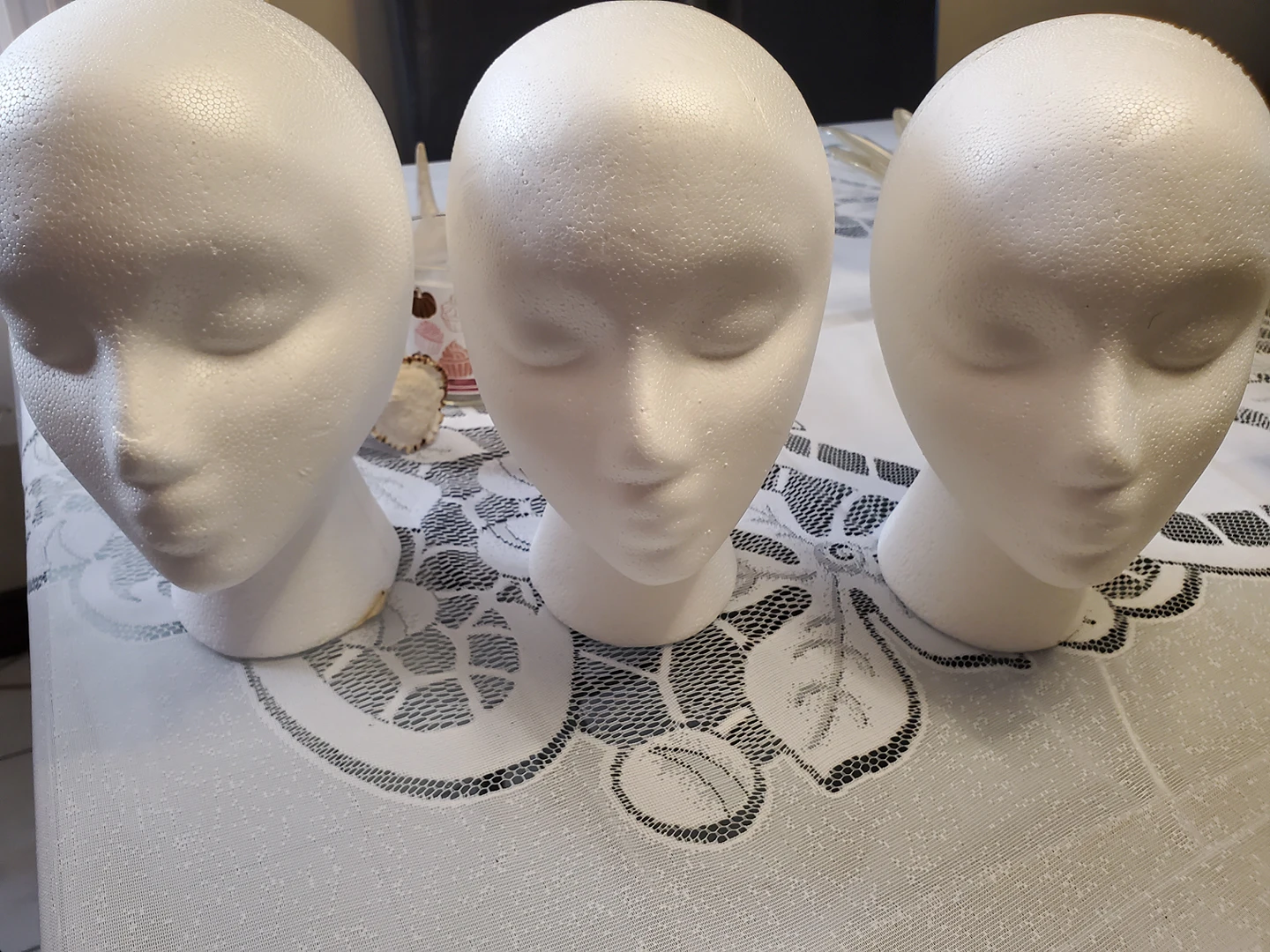 3 styrofoam display heads