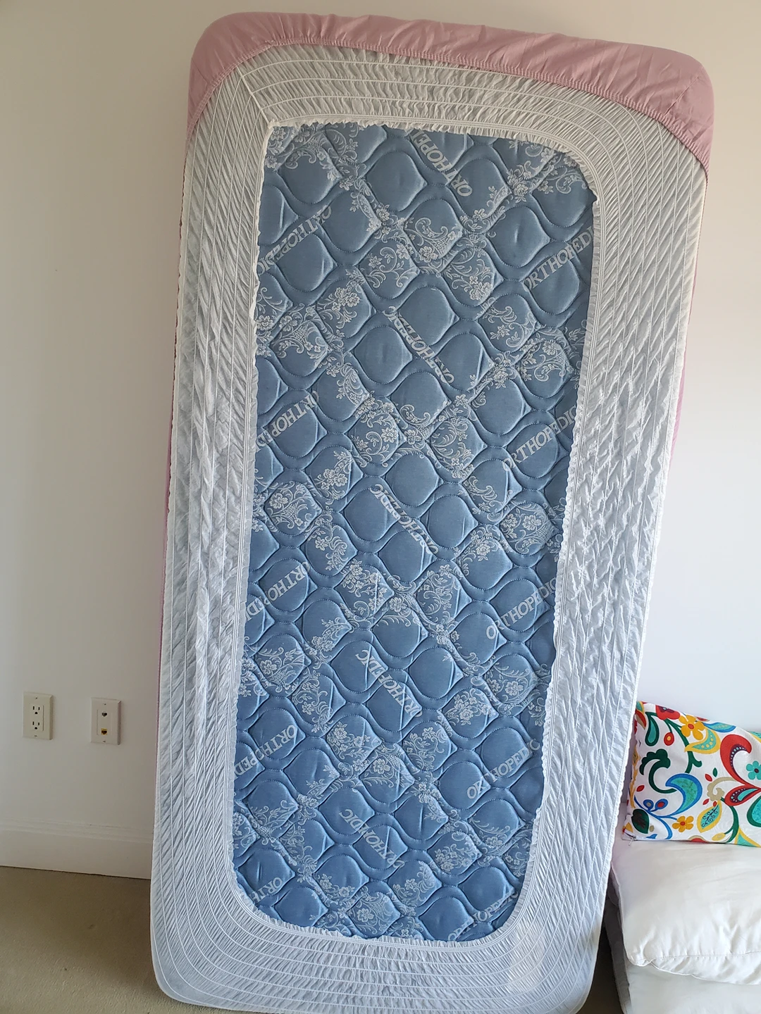 Single mattress, with cover sheet