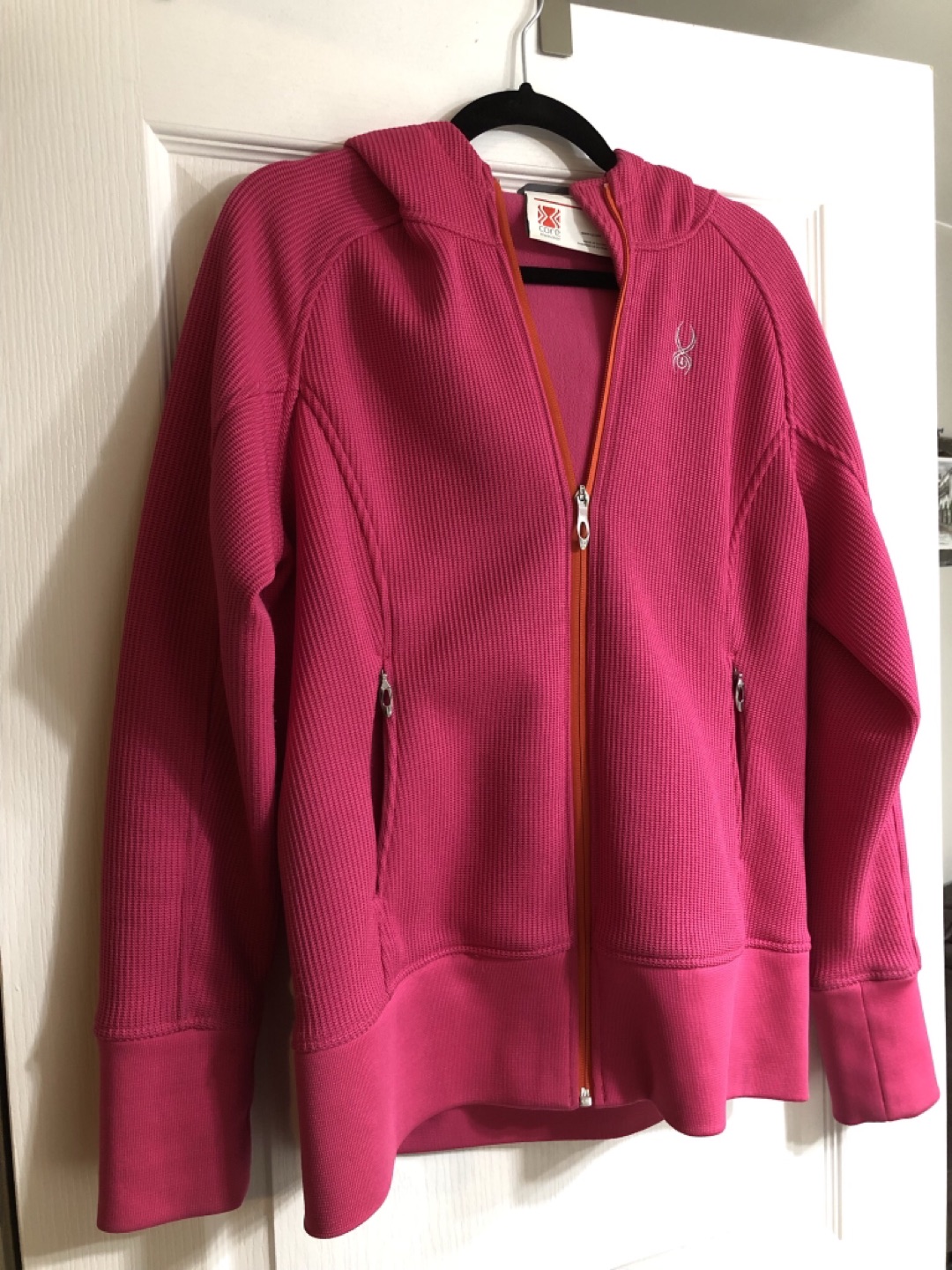 Spyder ladies core zip-up with hood.