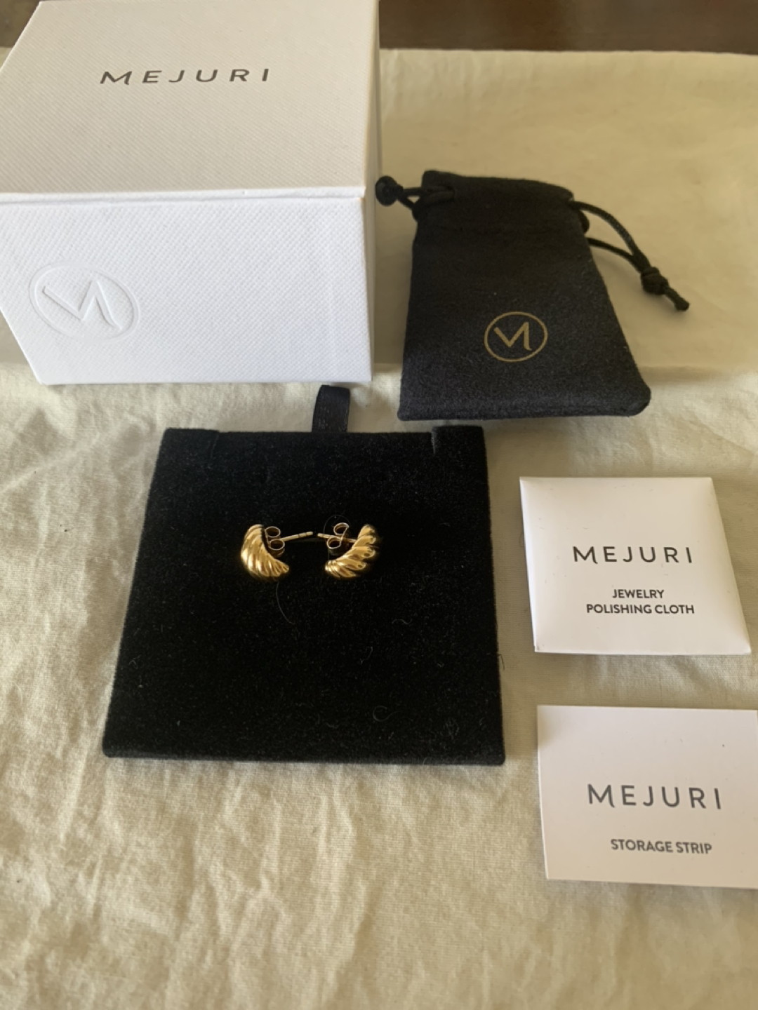 Mejuri crossaint earrings