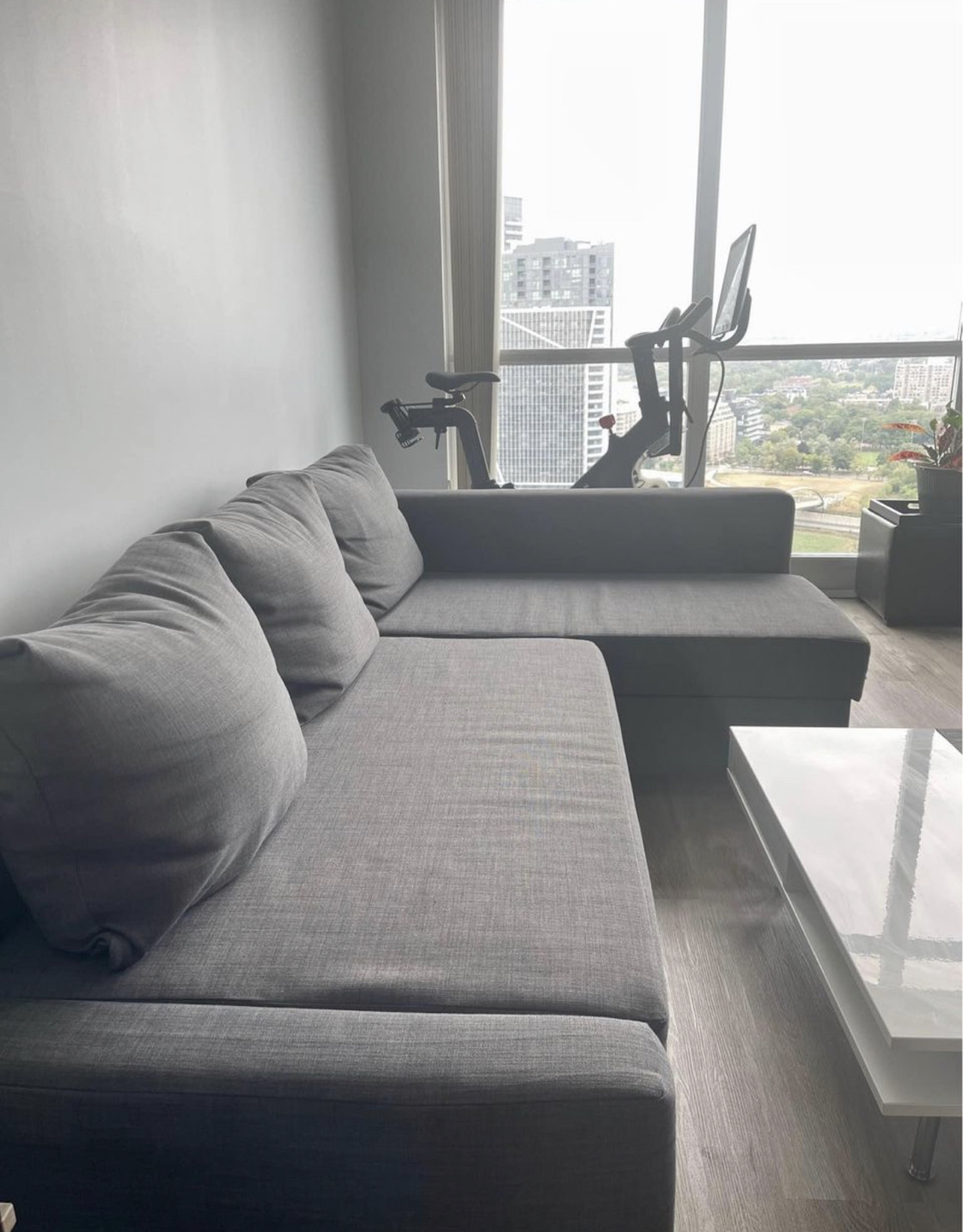 Corner sofa-bed with storage