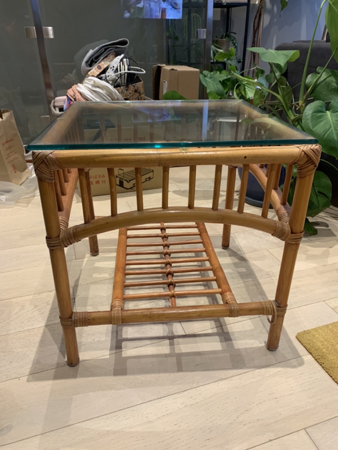 Rattan and glass side table