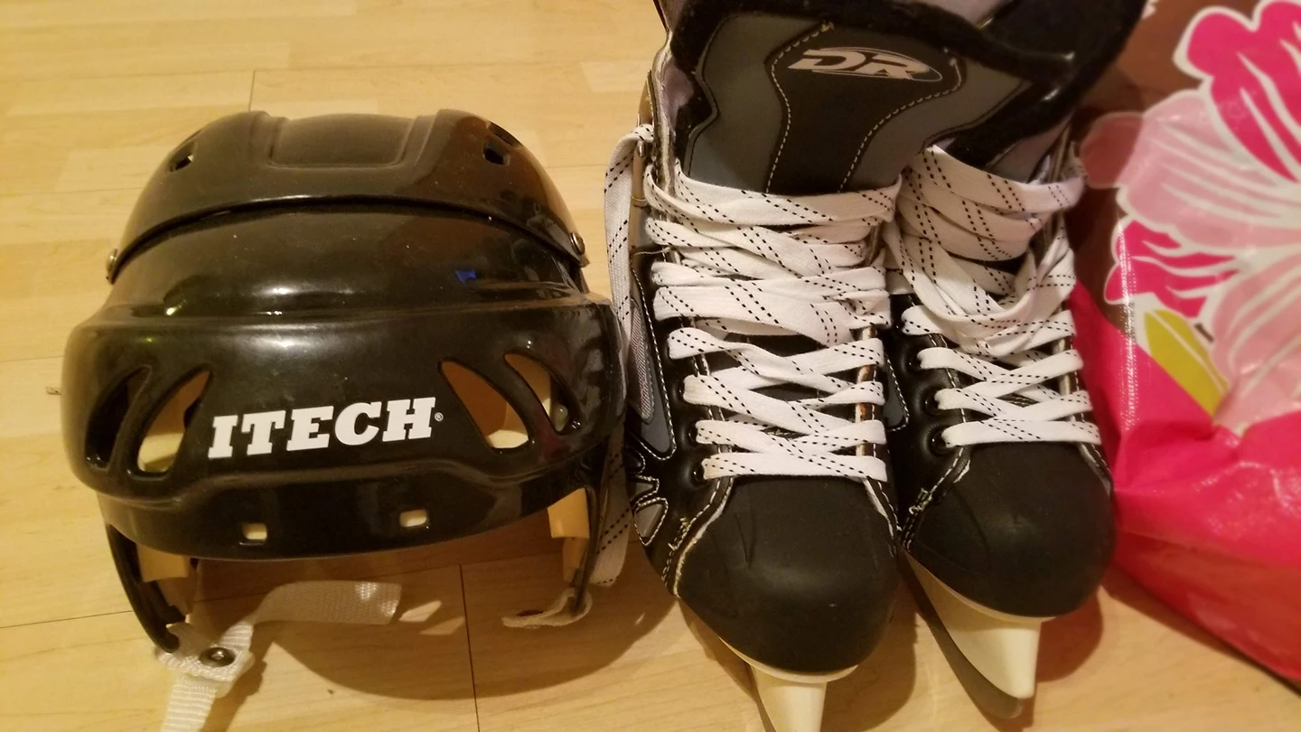 Ice skates and helmet