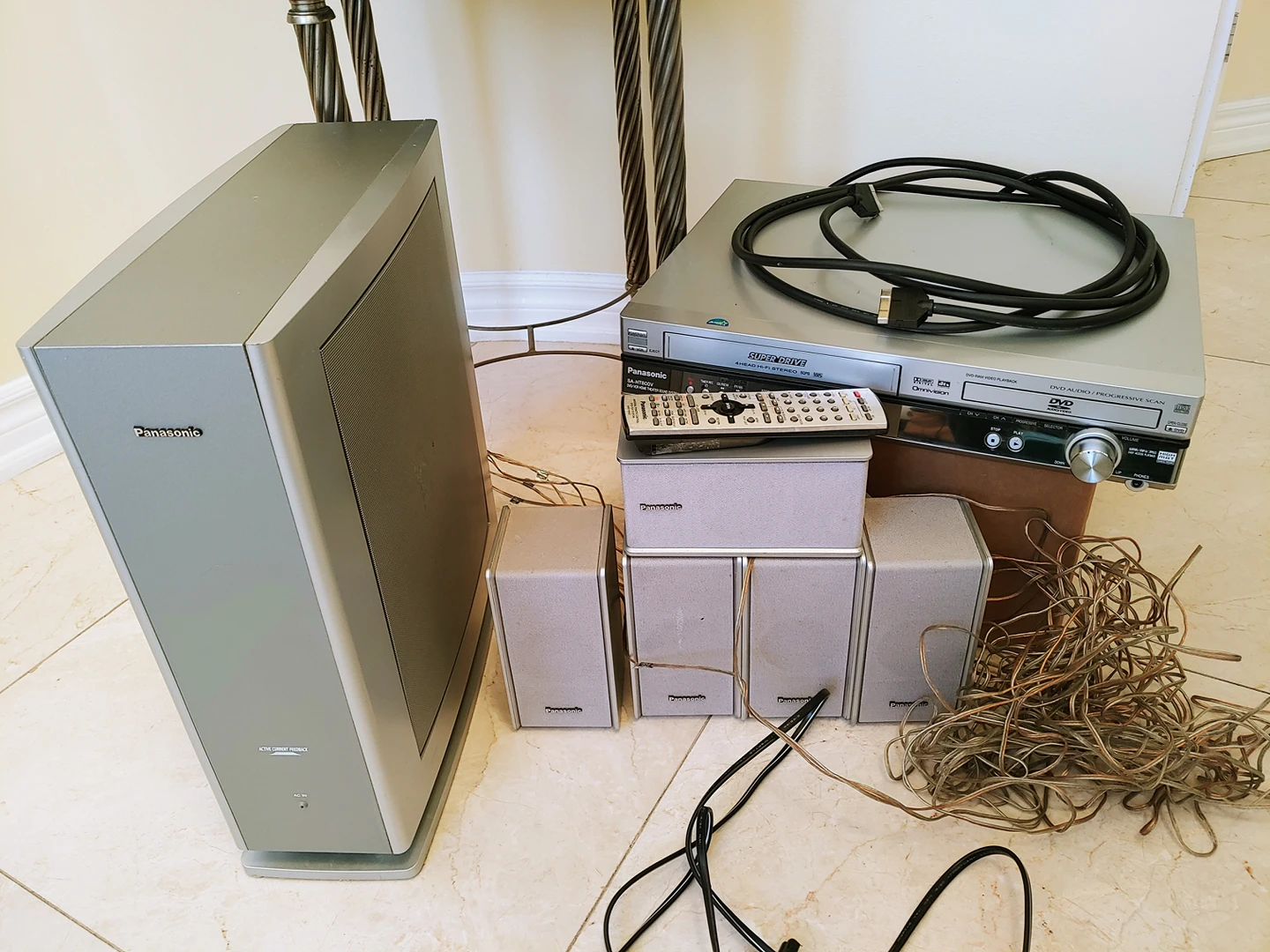 Panasonic 5:1 home theatre with receiver and remote thumbnail