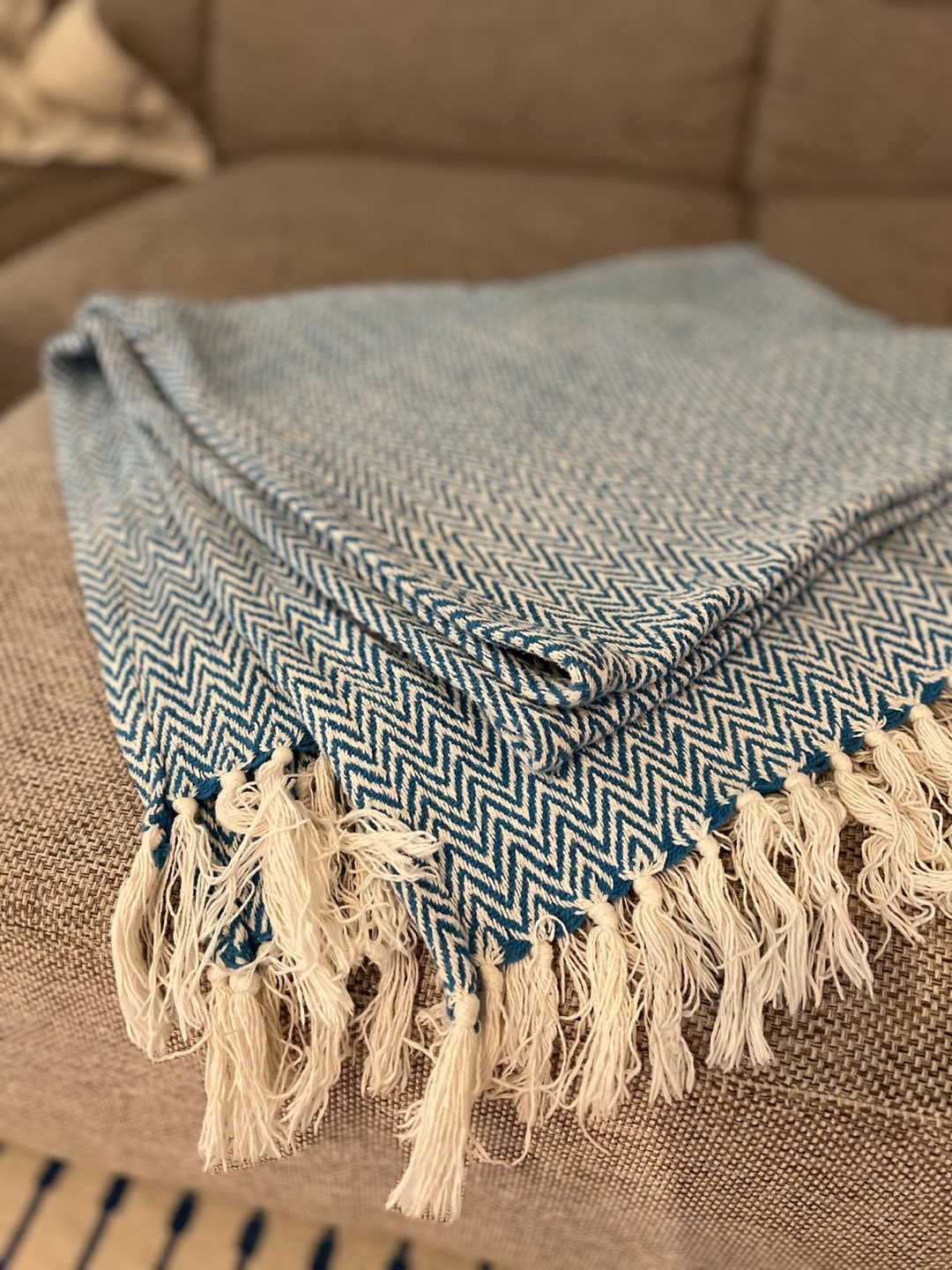 Knitted blue chevron throw blanket