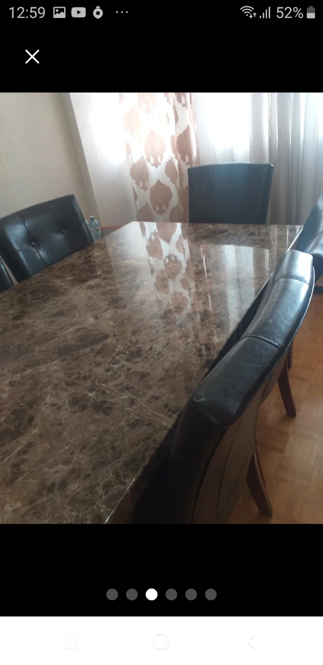 Marble style dinning table, $200.No chairs image indicator(6)