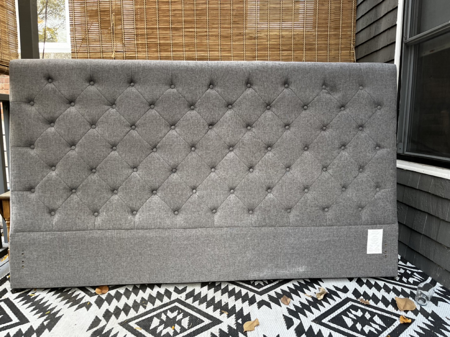 Grey tufted king headboard thumbnail