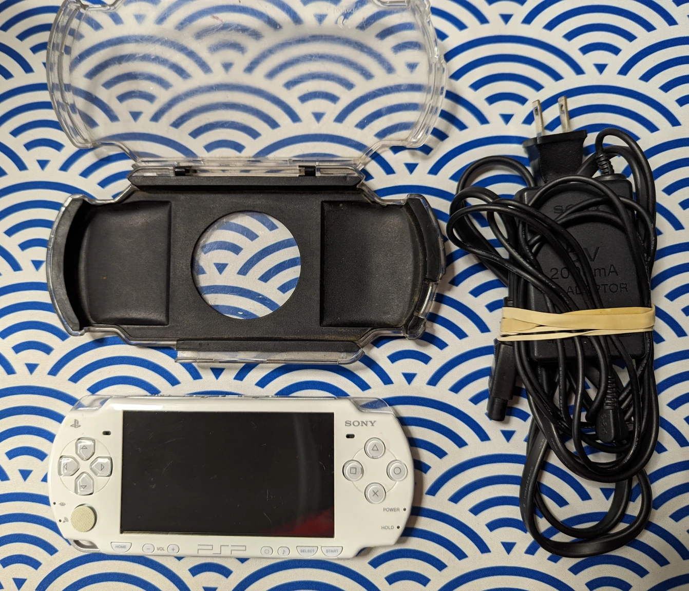 White PSP2000 with charger and case thumbnail