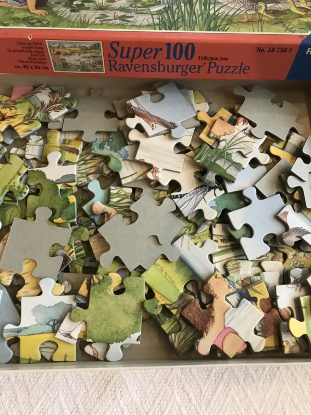 Two (2) Ravensburger Puzzles • 1 New (300 pieces) • 1 Used image indicator(4)