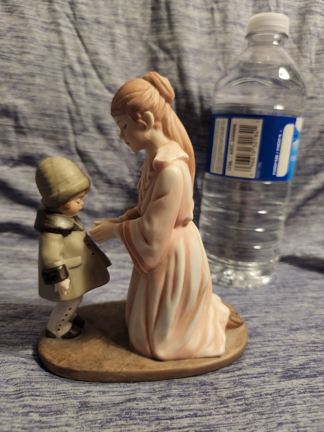 Treasured Memories - Dressing Warm porcelain figurine image indicator(2)
