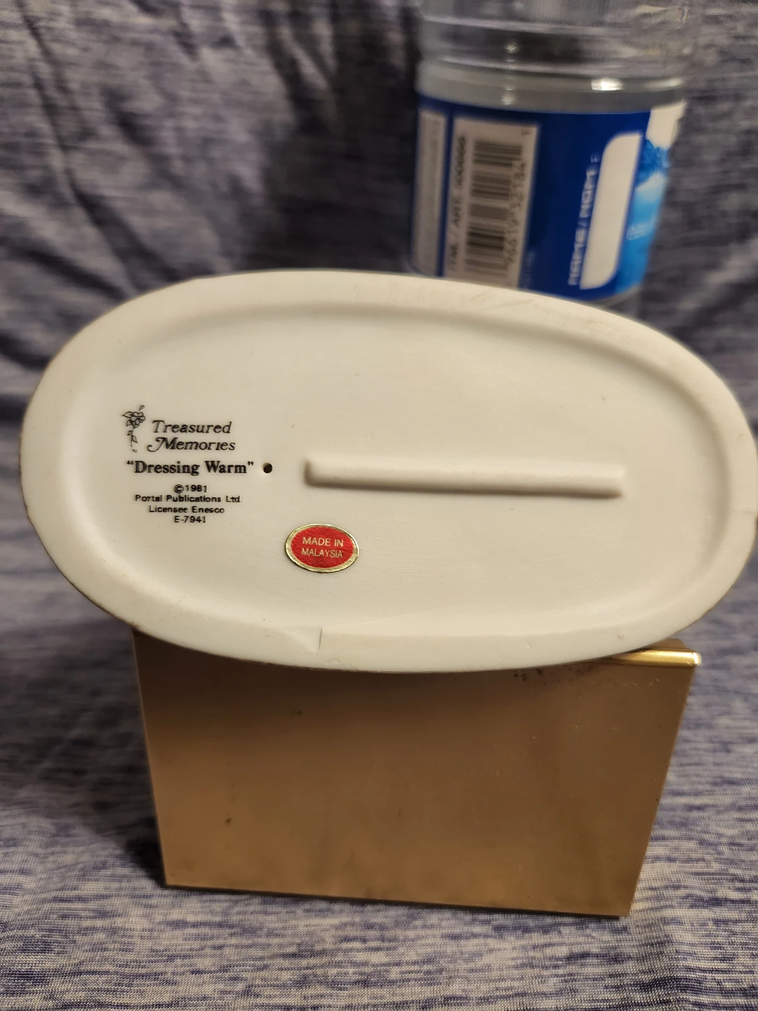 Treasured Memories - Dressing Warm porcelain figurine image indicator(3)