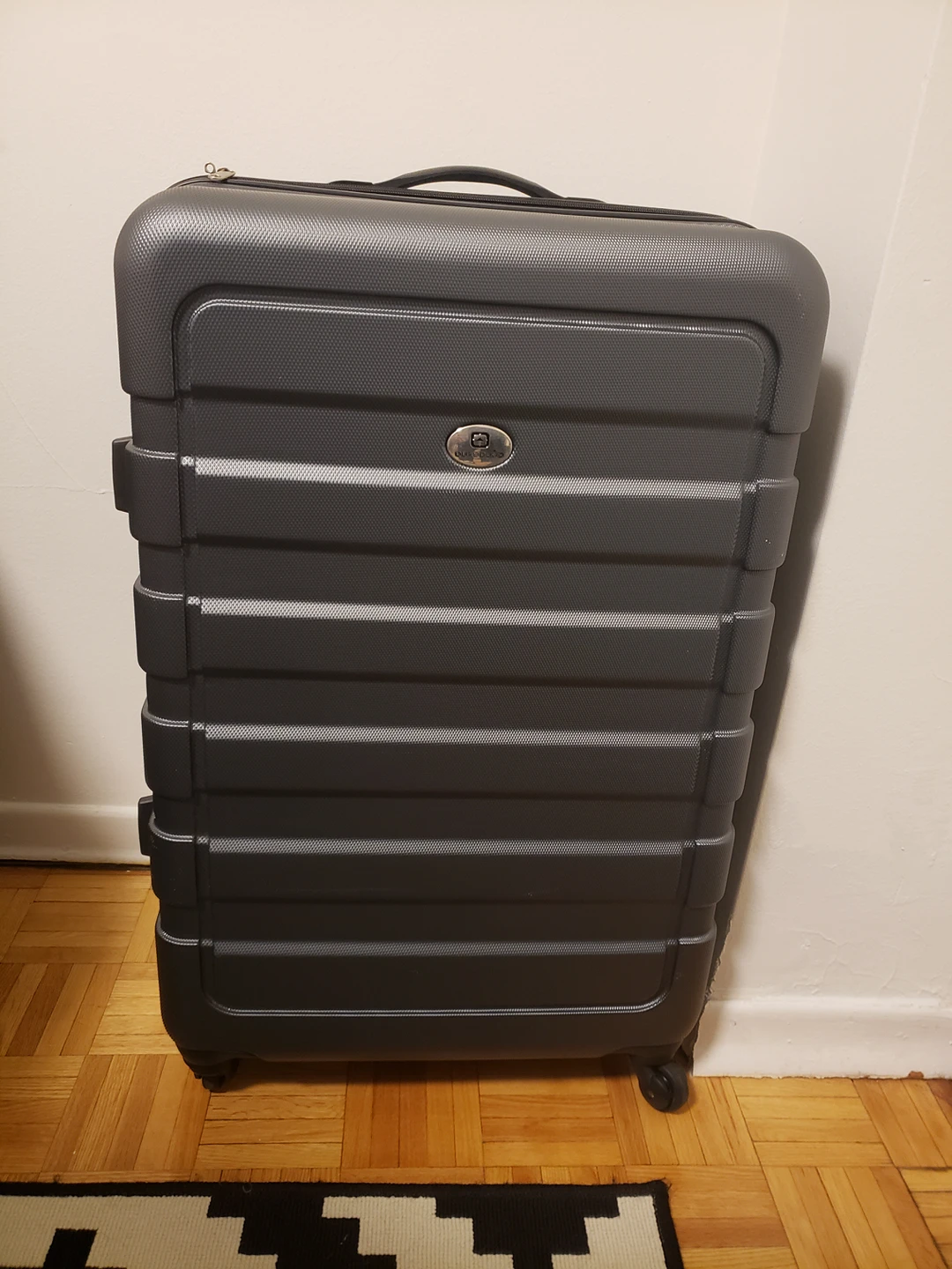 outbound large check in luggage 4 wheel thumbnail
