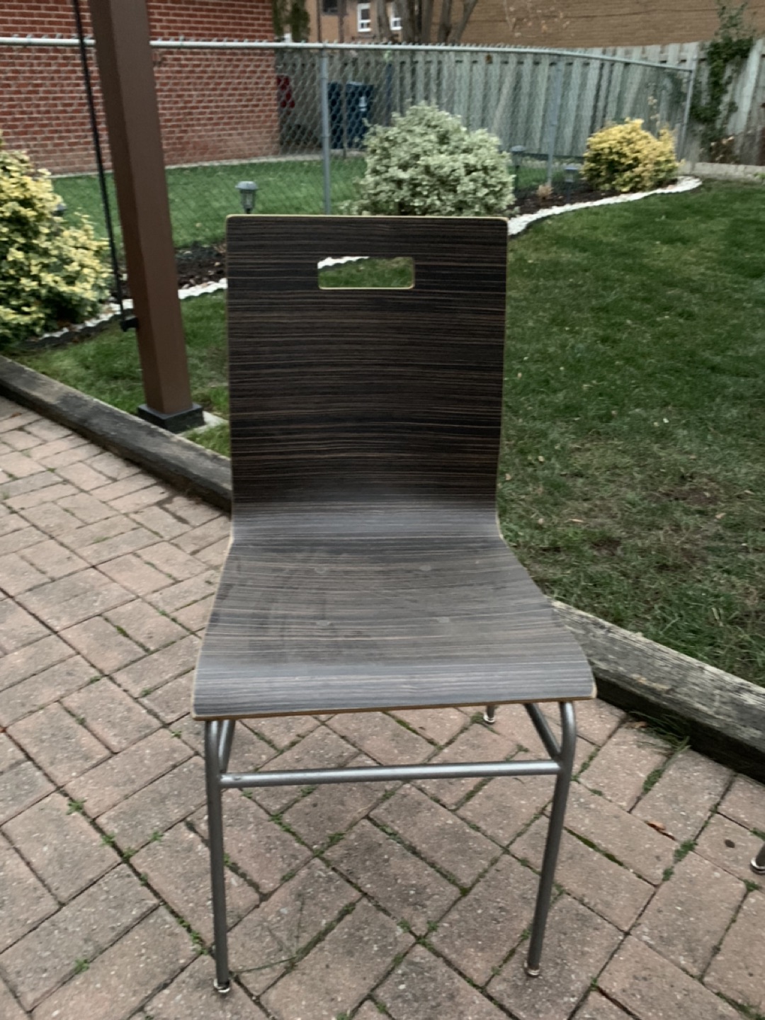 Wooden chairs with metal legs