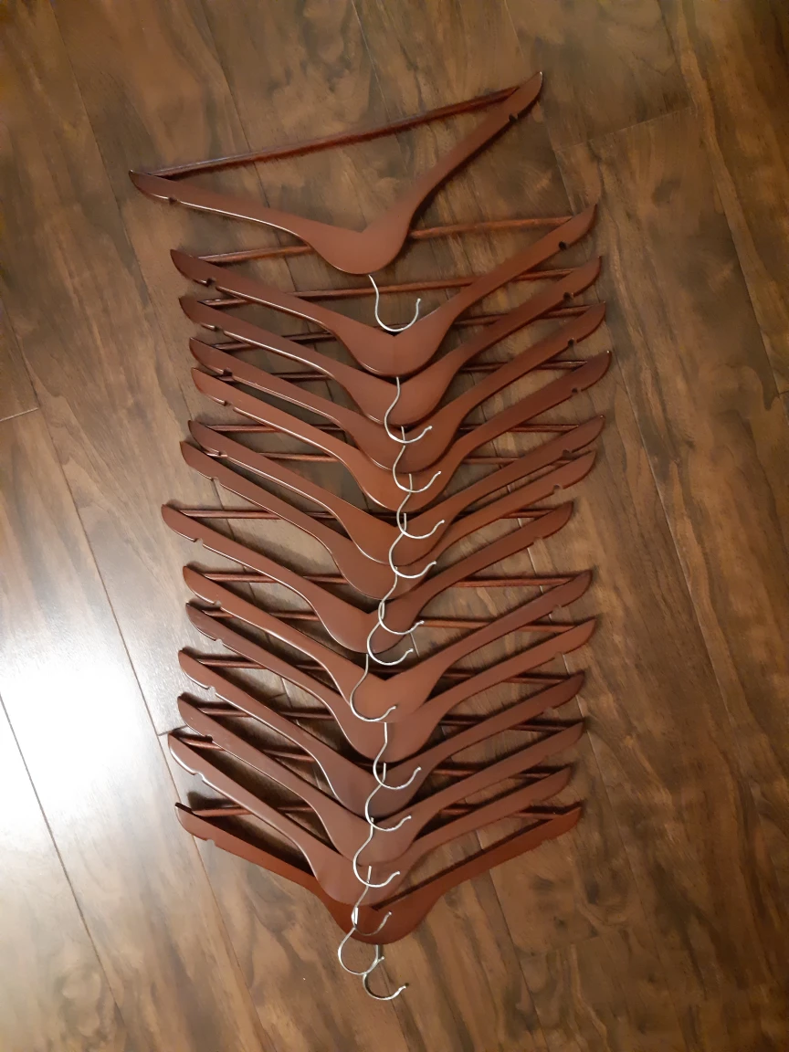 wooden hangers and black hangers