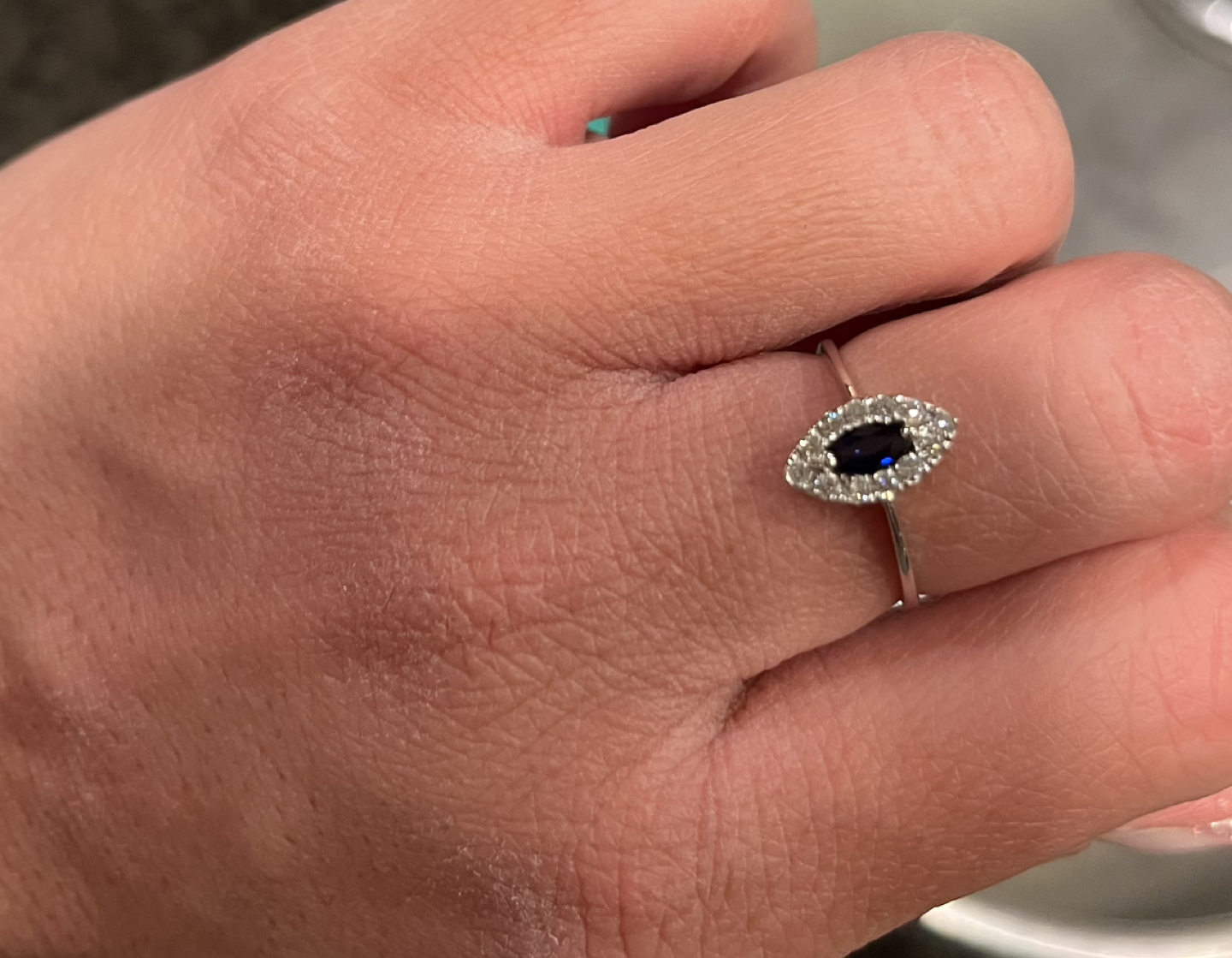 Genuine evil eye sapphire and diamond ring