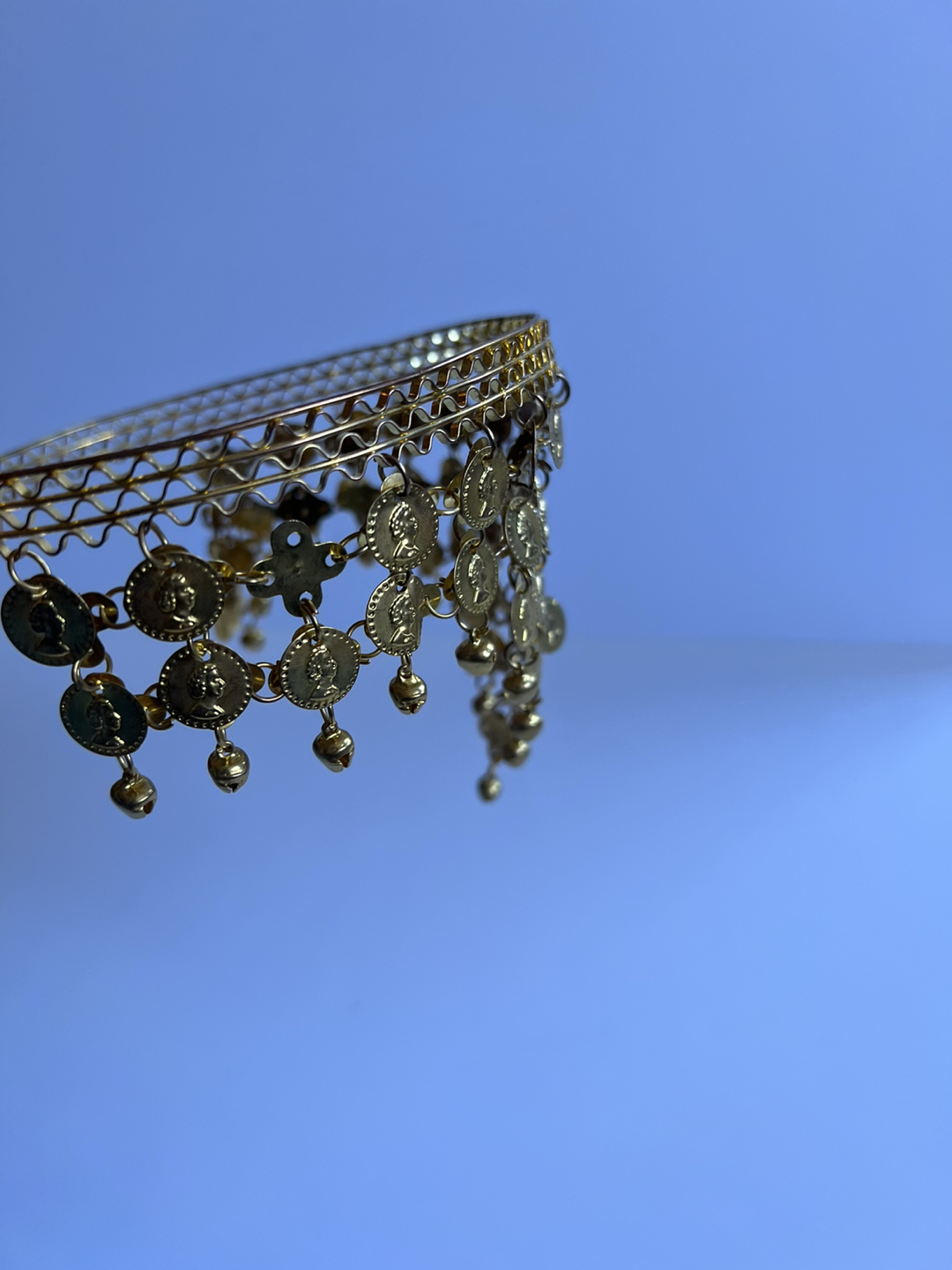 Coined head headpiece