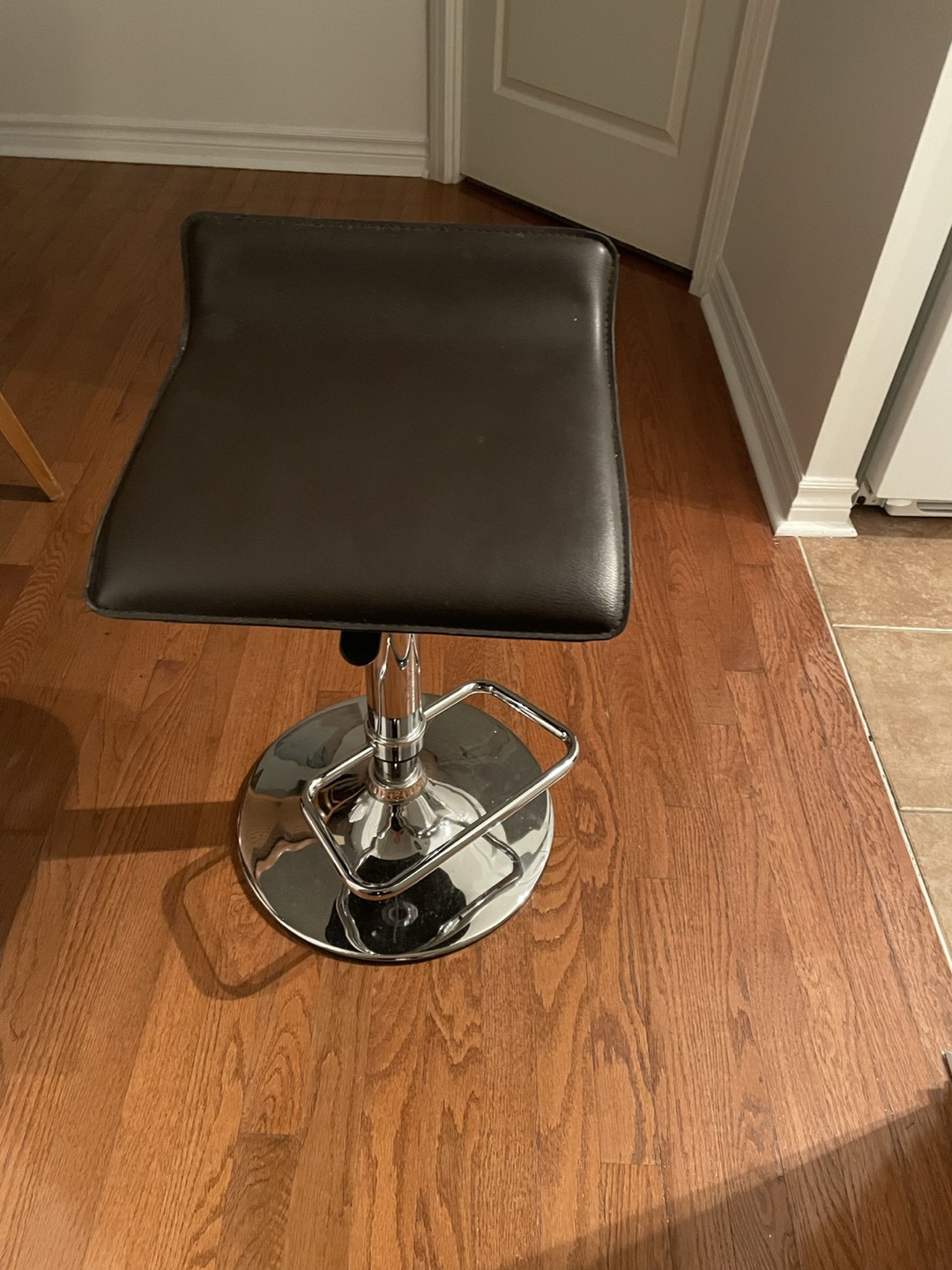 Hydrolic brown bar stool.. great to use as a table to thumbnail