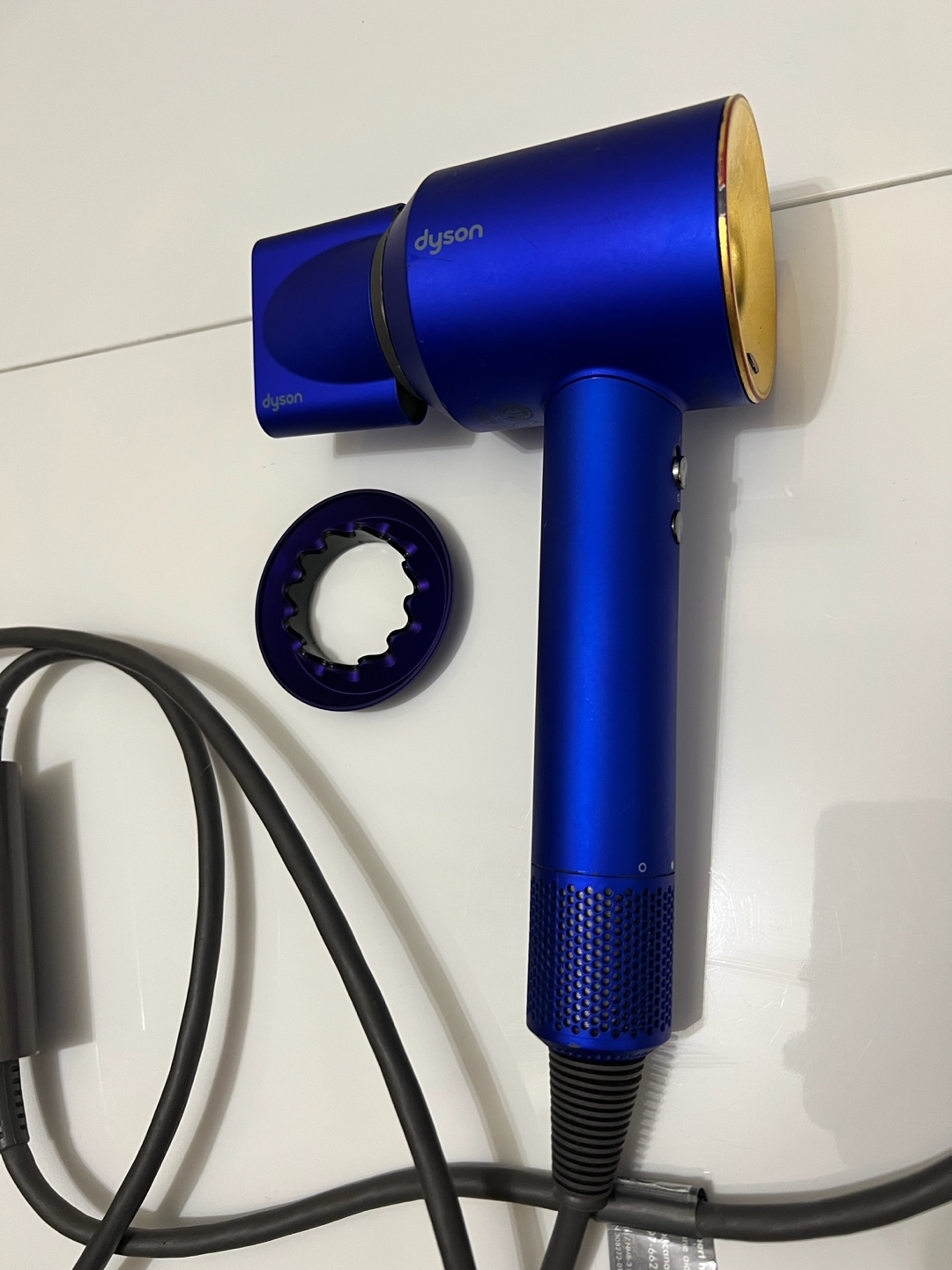 Dyson hair dryer with 2 attachments