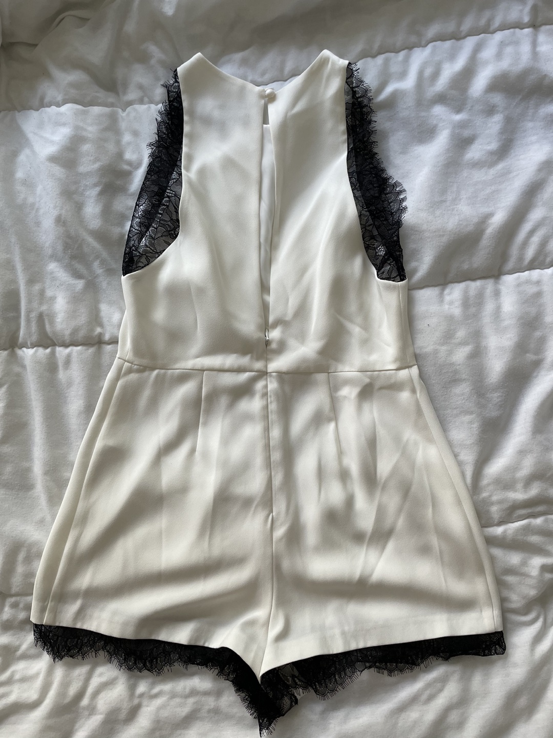 White Romper with black trim image indicator(2)