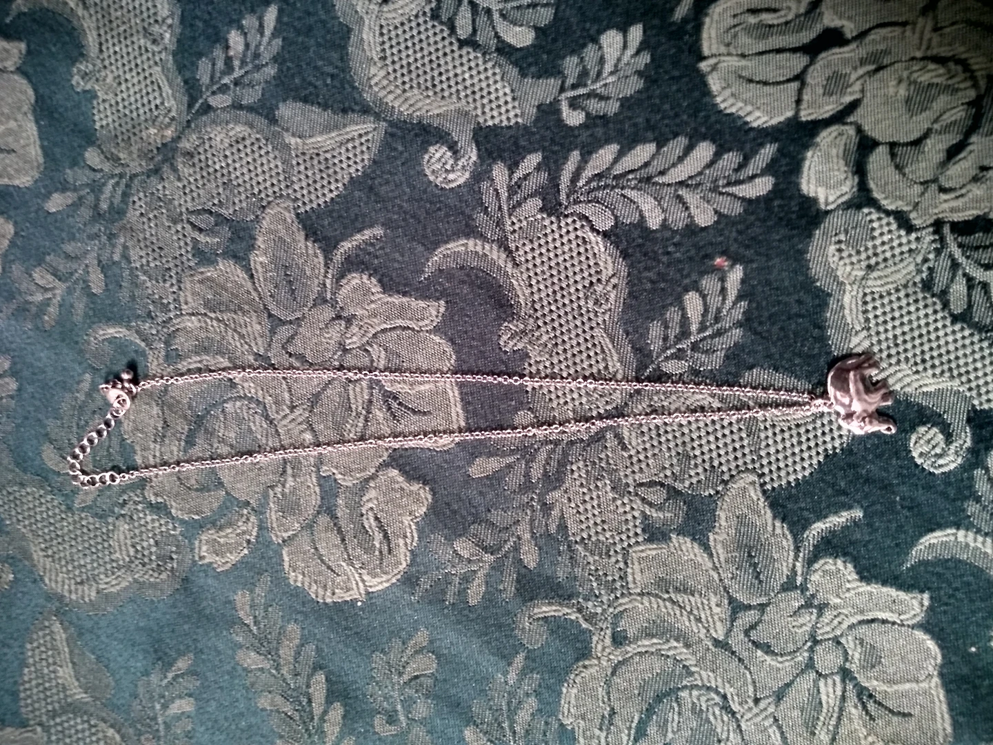 Sterling silver necklace with elephant charm.