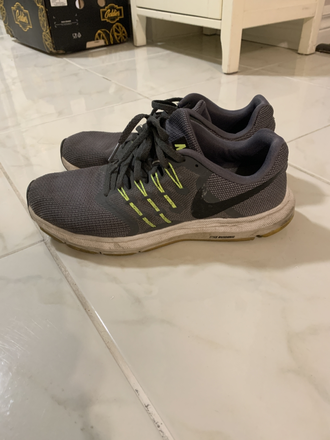 Nike  (man size 8.5). $8