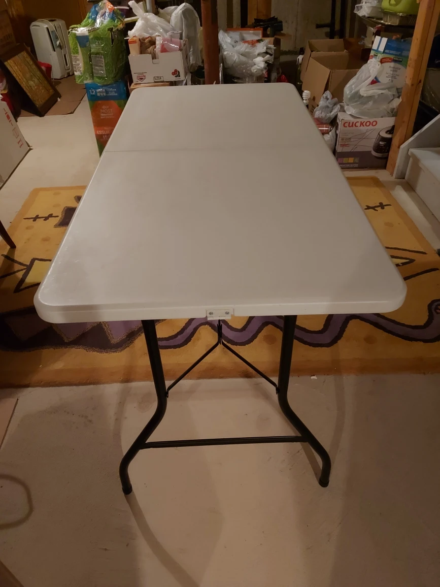 Plastic foldout table