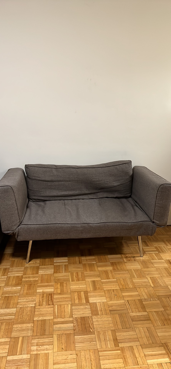 Convertible two seater sofa.