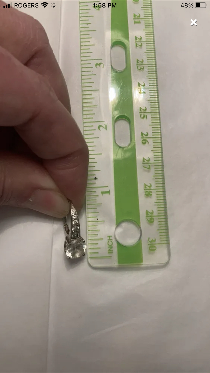 White sapphire stone earrings set in sterling silver image indicator(5)