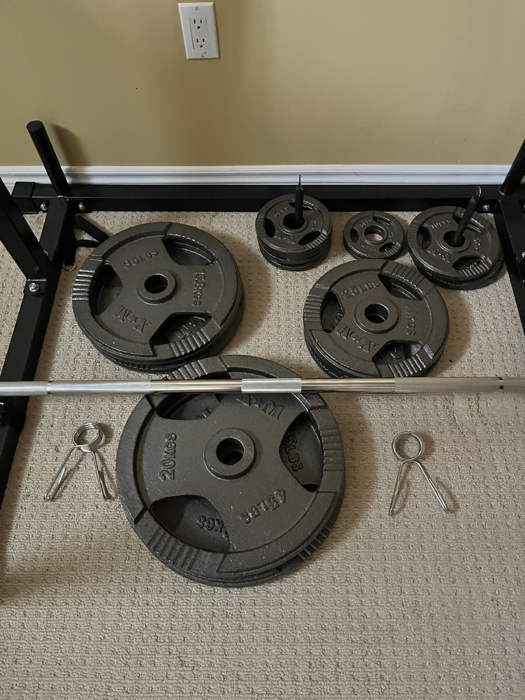 Olympic Barbell with 255 pounds of steel plates thumbnail