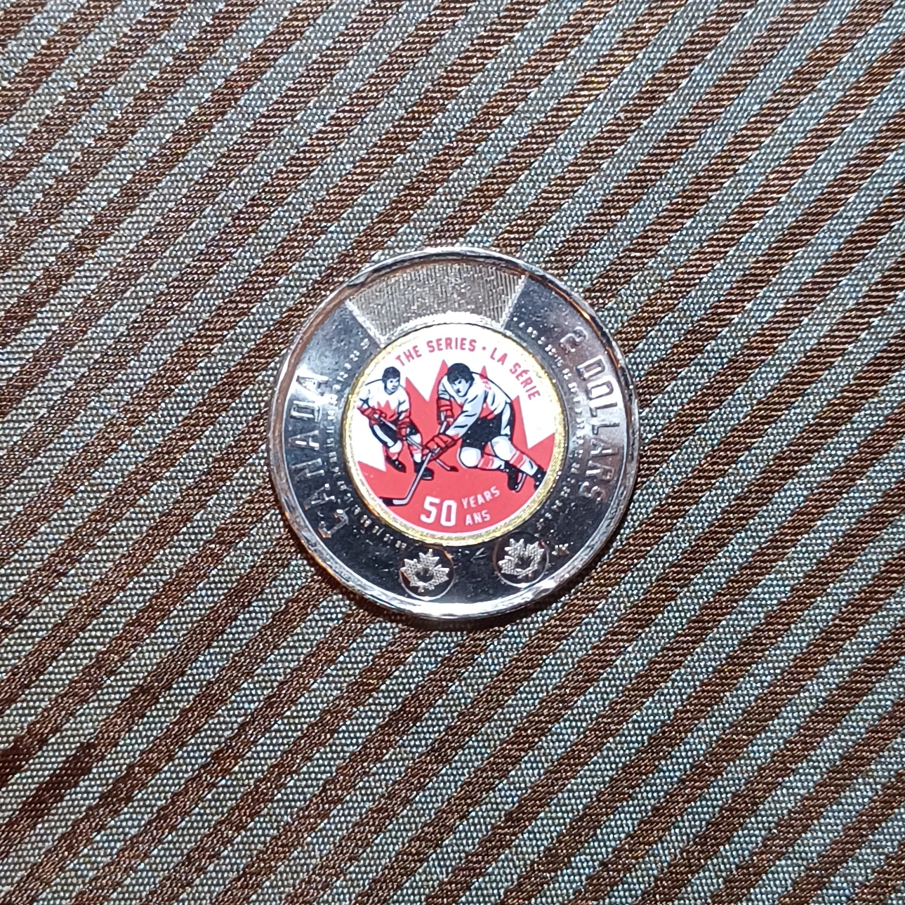 2022 colored hockey toonie thumbnail