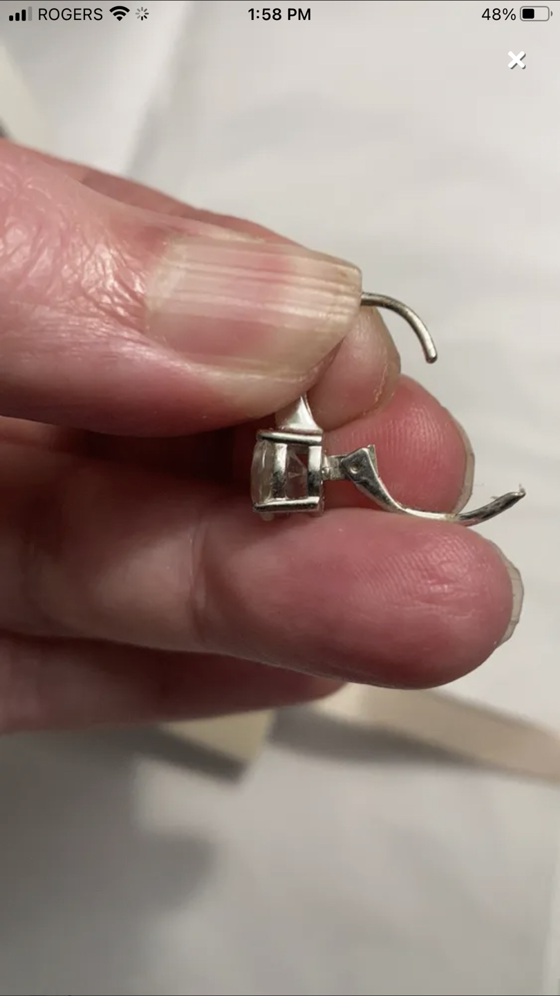 White sapphire stone earrings set in sterling silver image indicator(3)