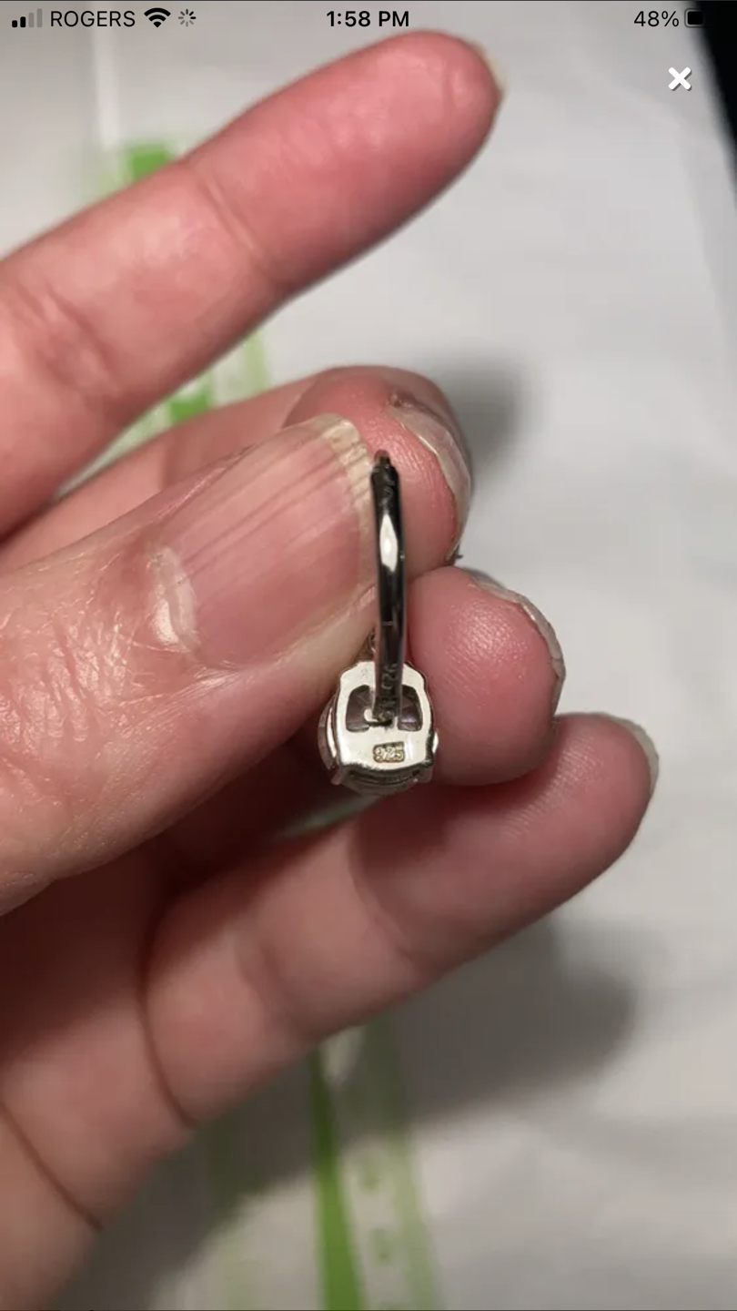 White sapphire stone earrings set in sterling silver image indicator(2)