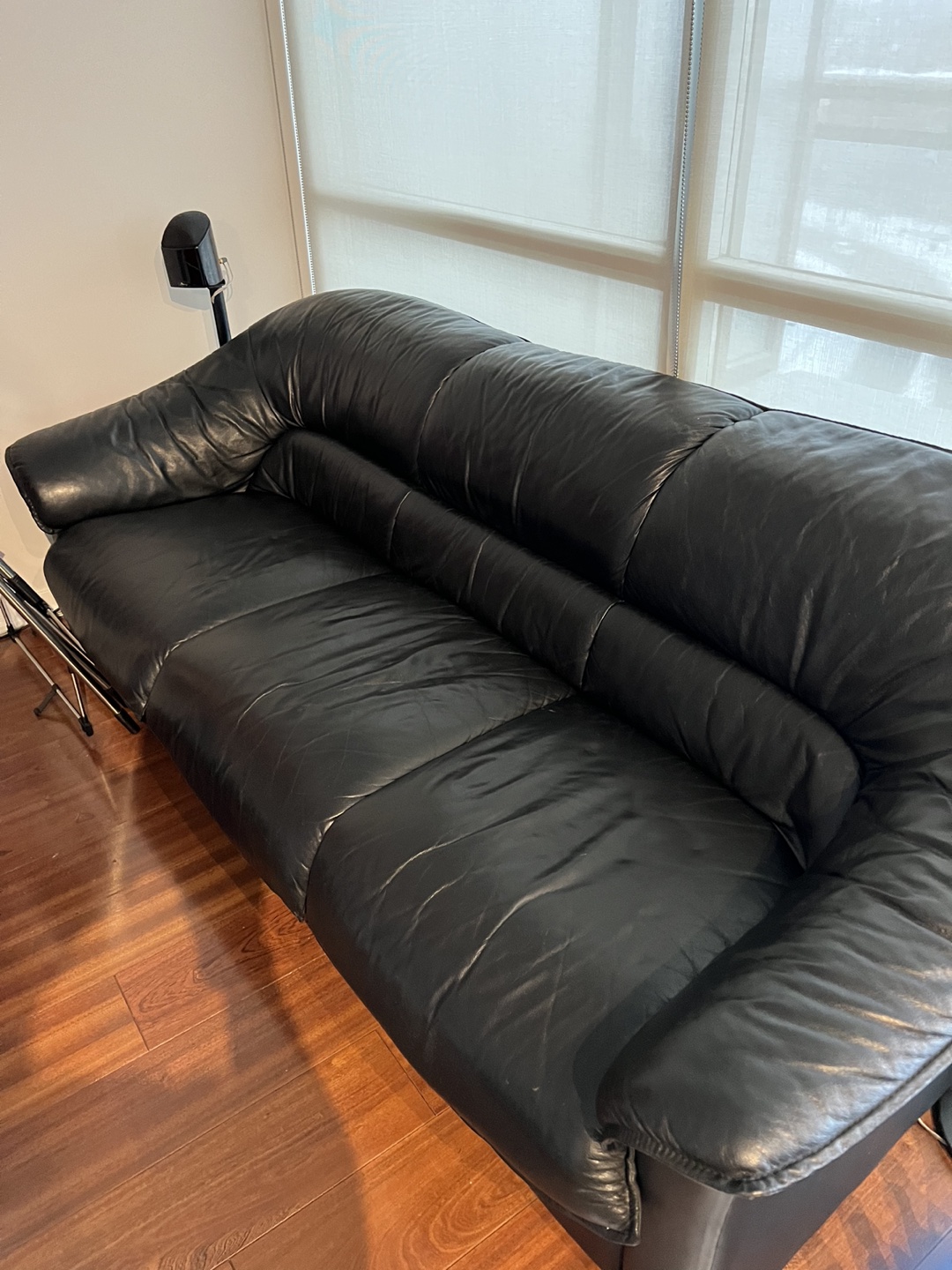 Used black leather sofa.