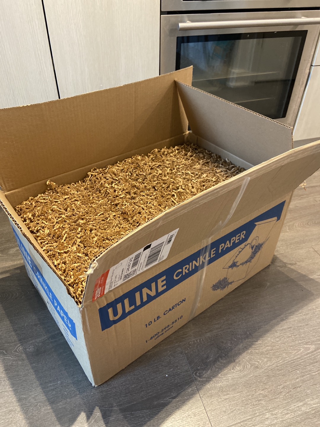 10lb of brown crinkle paper.