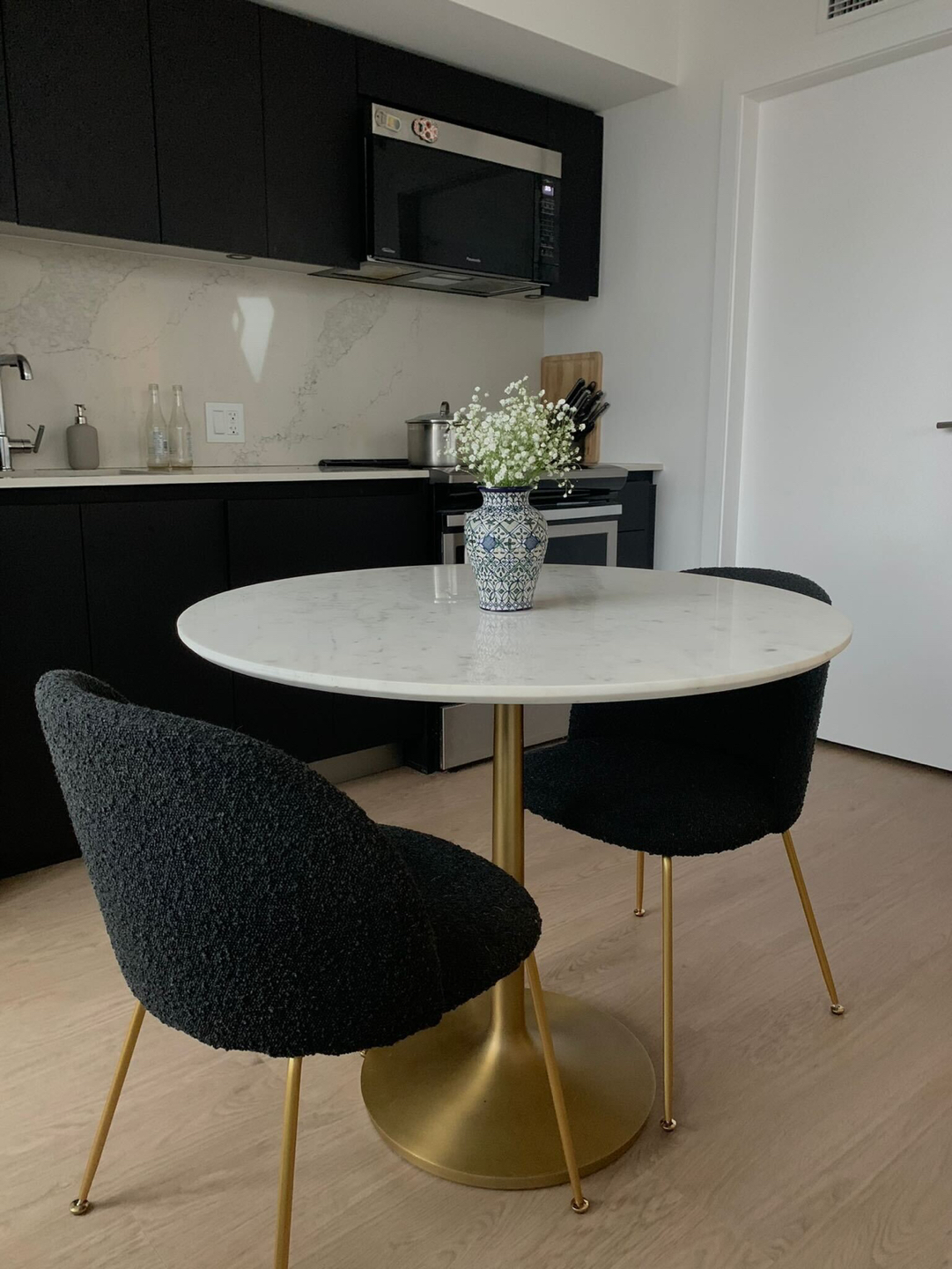 *NEW* Black bouclé dining chairs with brass legs - $150 each